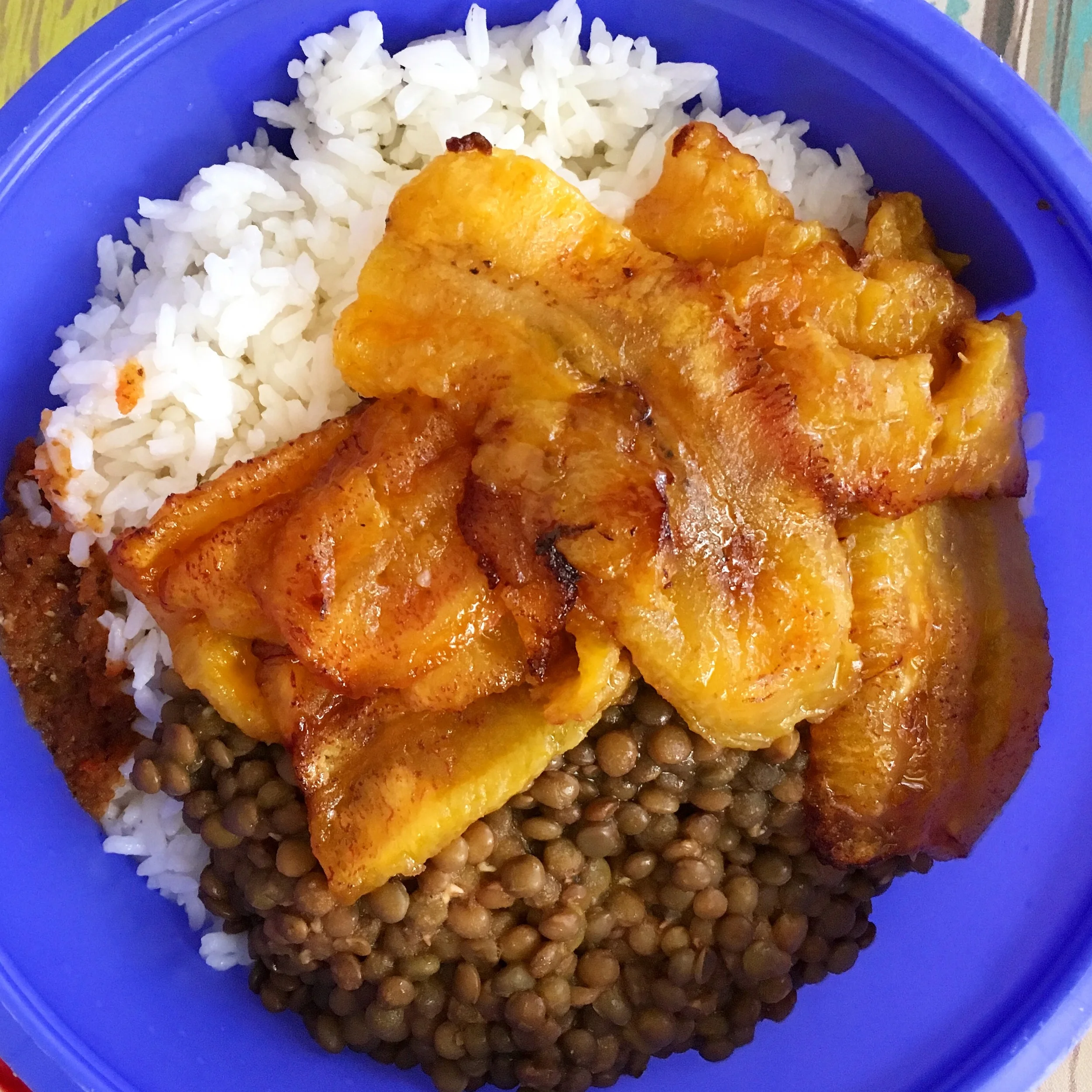 A vegetarian meal of lentils, rice and fried plantains. This was a special request, as none of her main courses come without meat.