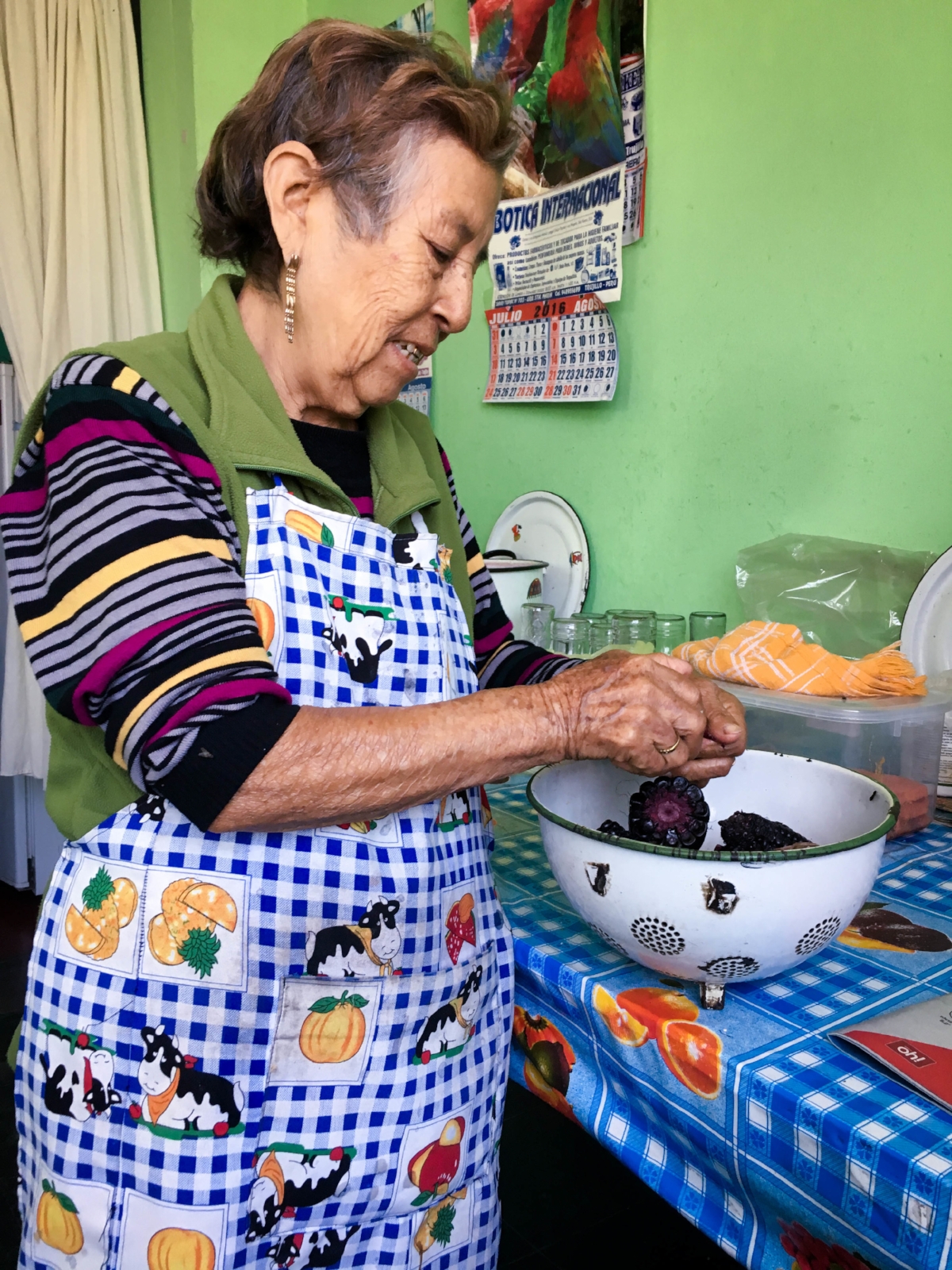 Esperanza preparing the purple maize for the chicha morada beverage.