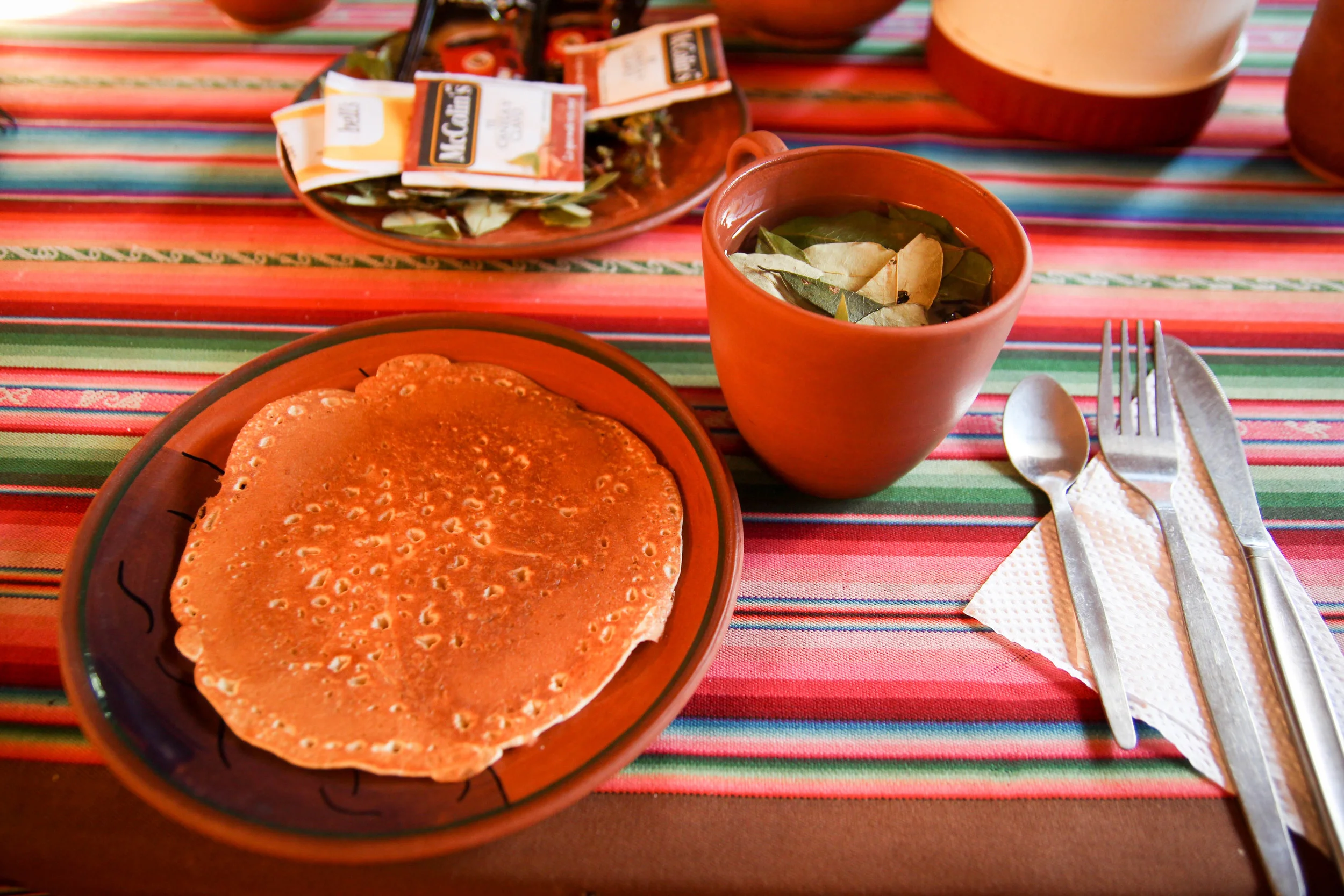Pancake breakfast with coca leaf tea on Lake Titikaka. There were no accompaniments to the cooked dough.