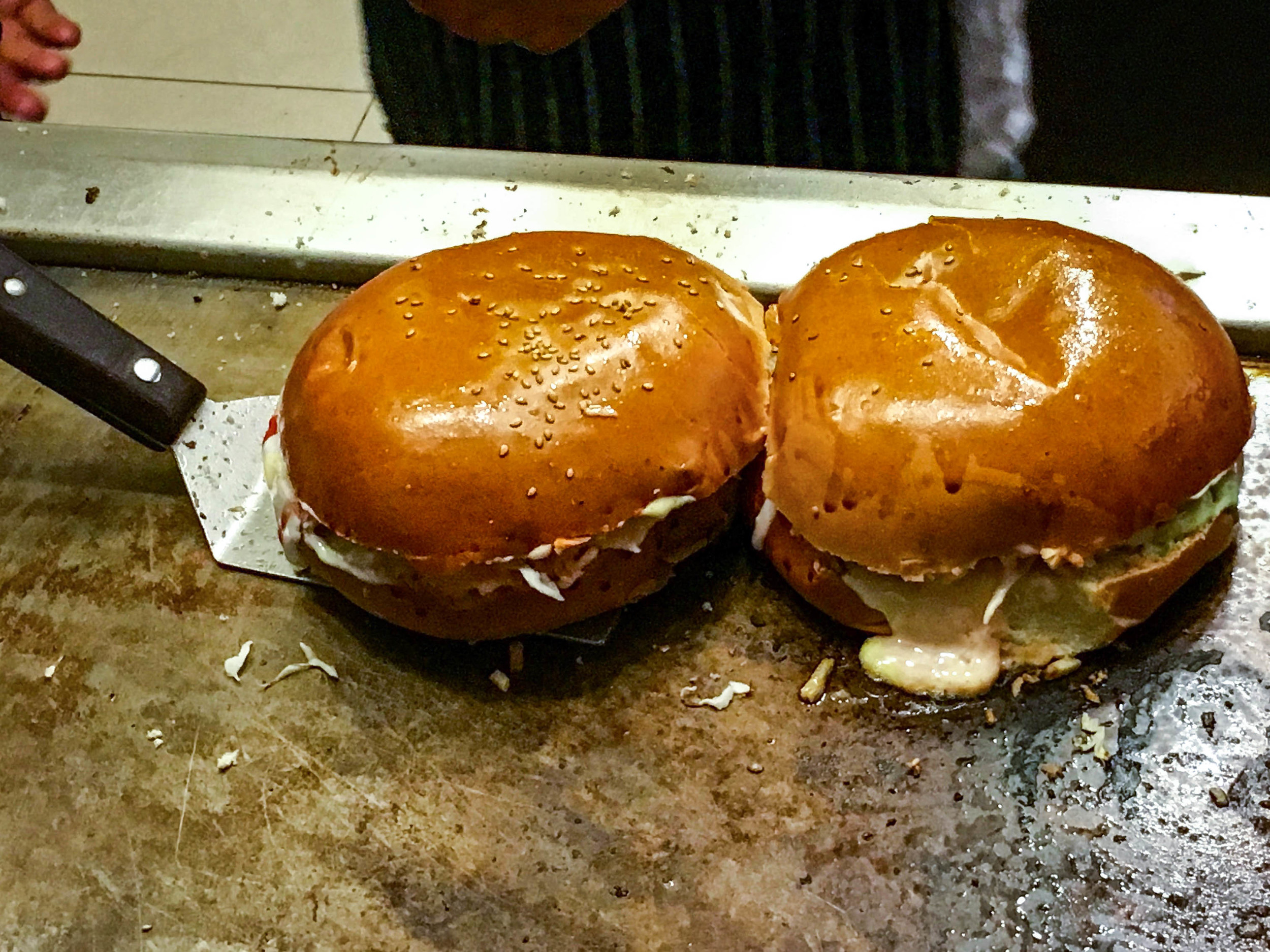 Peruvian hamburgers- The buns dominate all of the contents. 