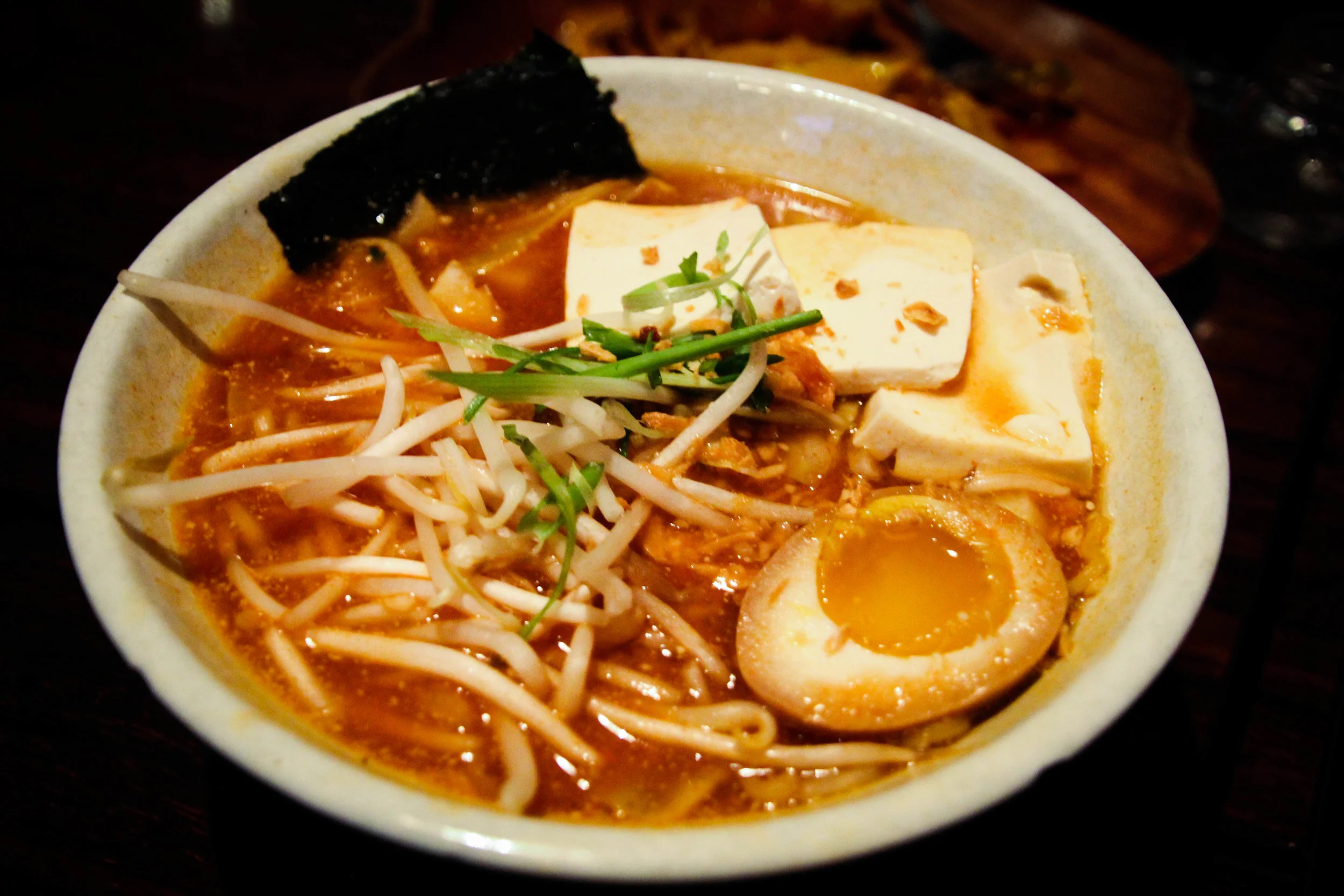 Veggie Ramen: Vegan broth topped with tofu, bean sprouts, cabbage and egg
