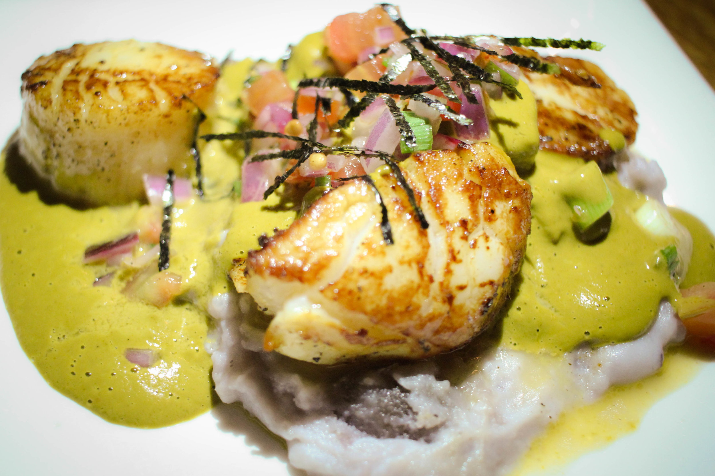 Scallops Fisho: Day boat scallops pan seared with blue mashed potatoes, sarsa panchita.