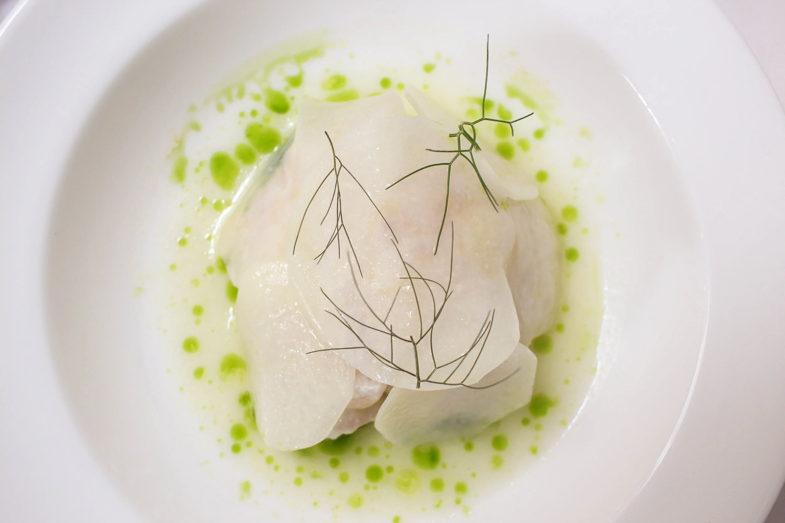 Halibut ceviche with kohlrabi, serrano, and pepitas