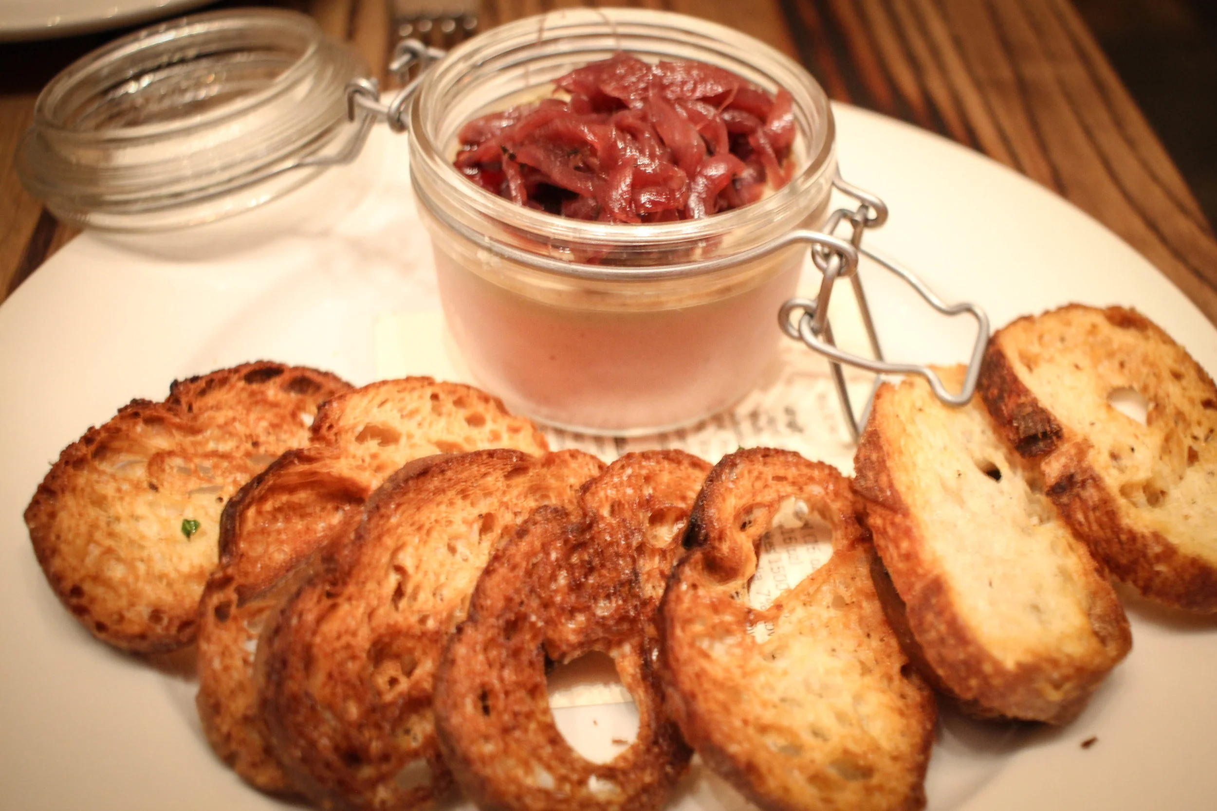 Potted chicken-liver mousse, port wine onion jam, olive crostini