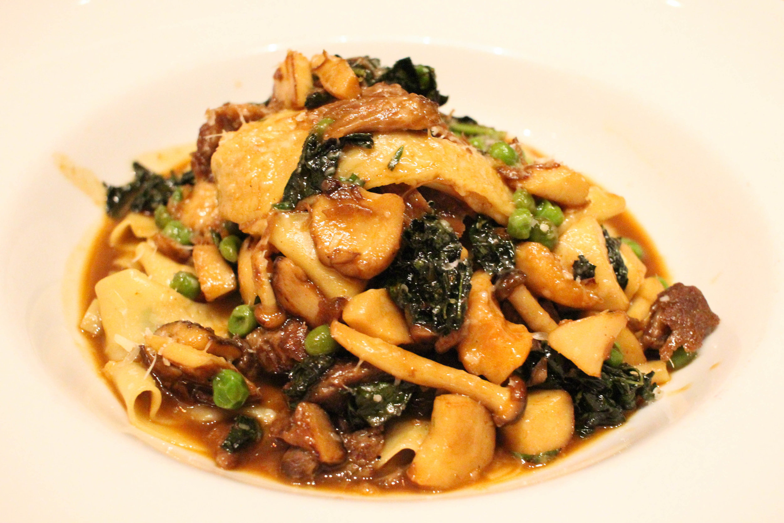 Pappardelle with pork cheeks, peas, kale, brown beech mushrooms, tarragon, pecorino