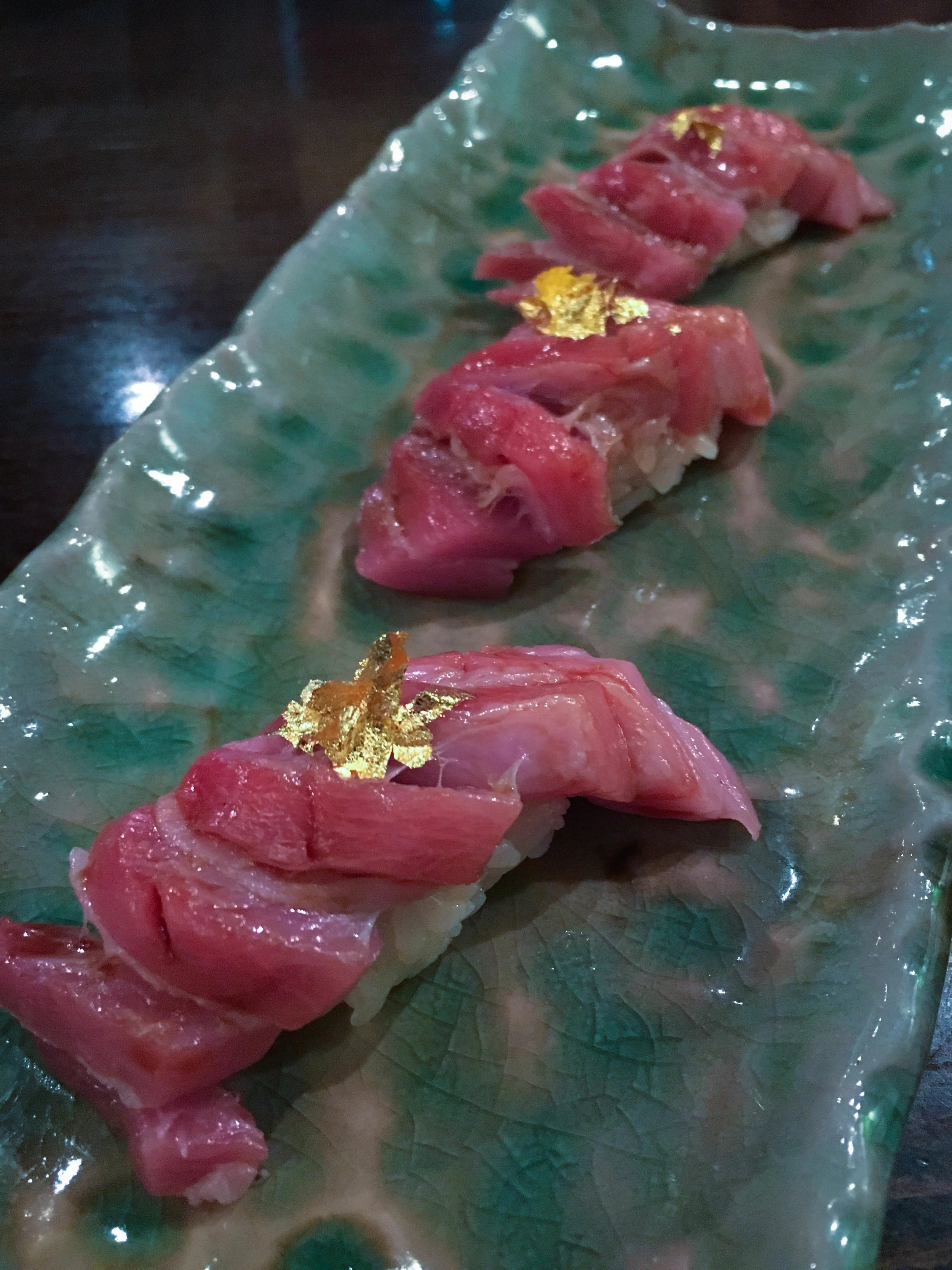 Edible gold on top of medium fatty tuna
