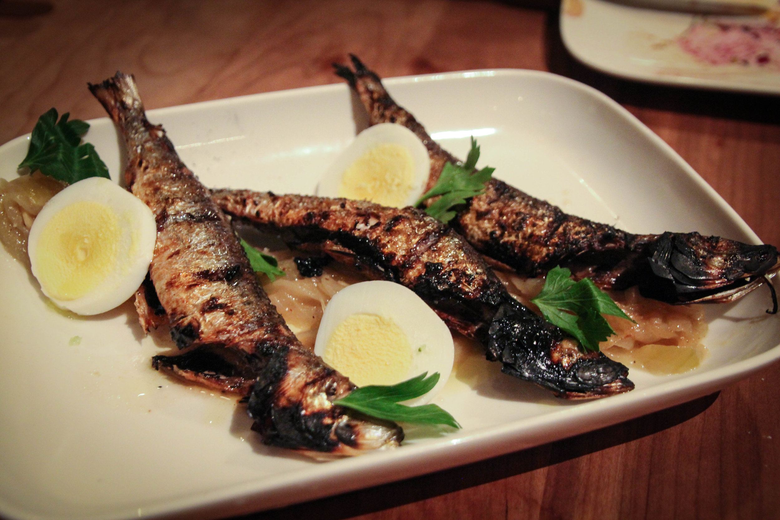 Sardinhas Asadas: grilled monterey sardines, caramelized onions, egg