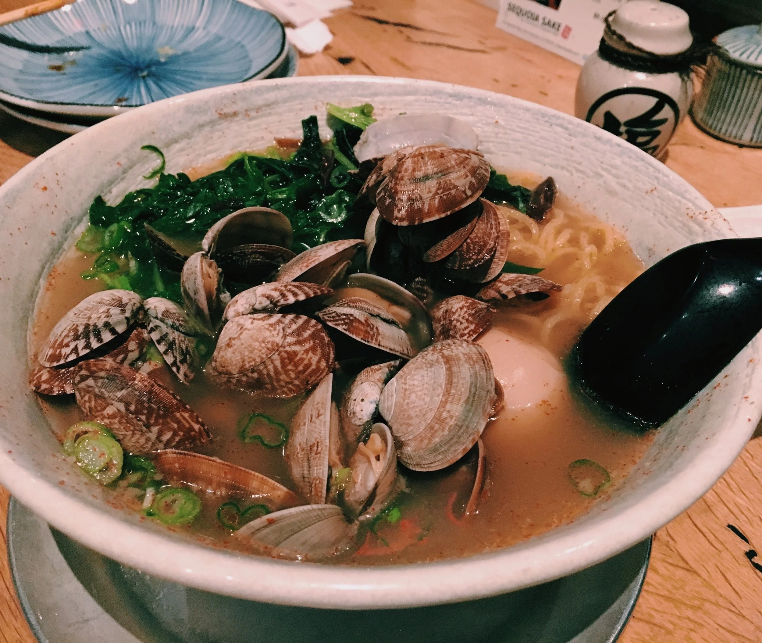 Clam Garlic Ramen: clams, green onion, seaweed, lemon zest, garlic, shrimp oil, Japanese mustard, and butter