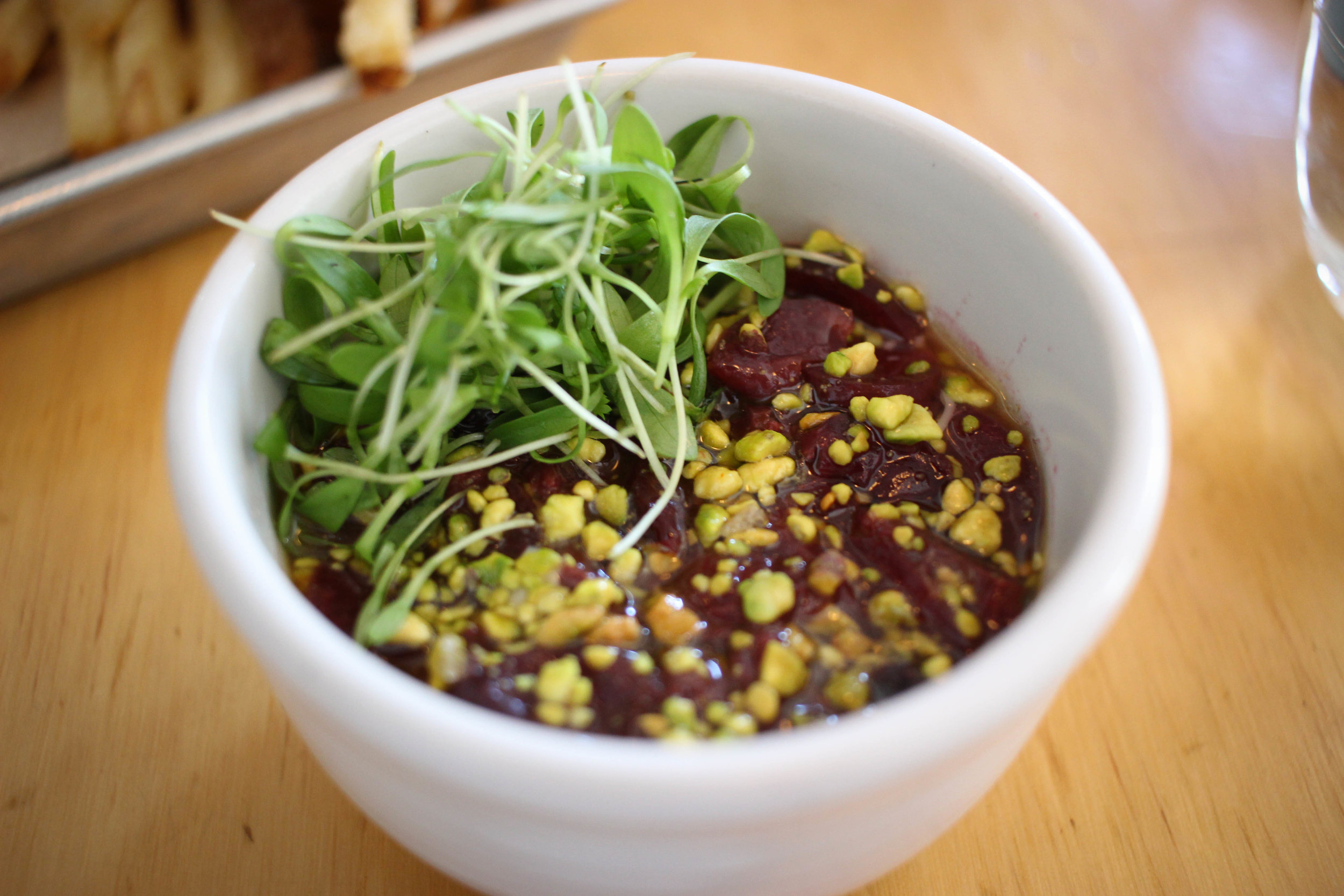 Fava'd mushroom broth chawanmushi, cherry, and pistachio