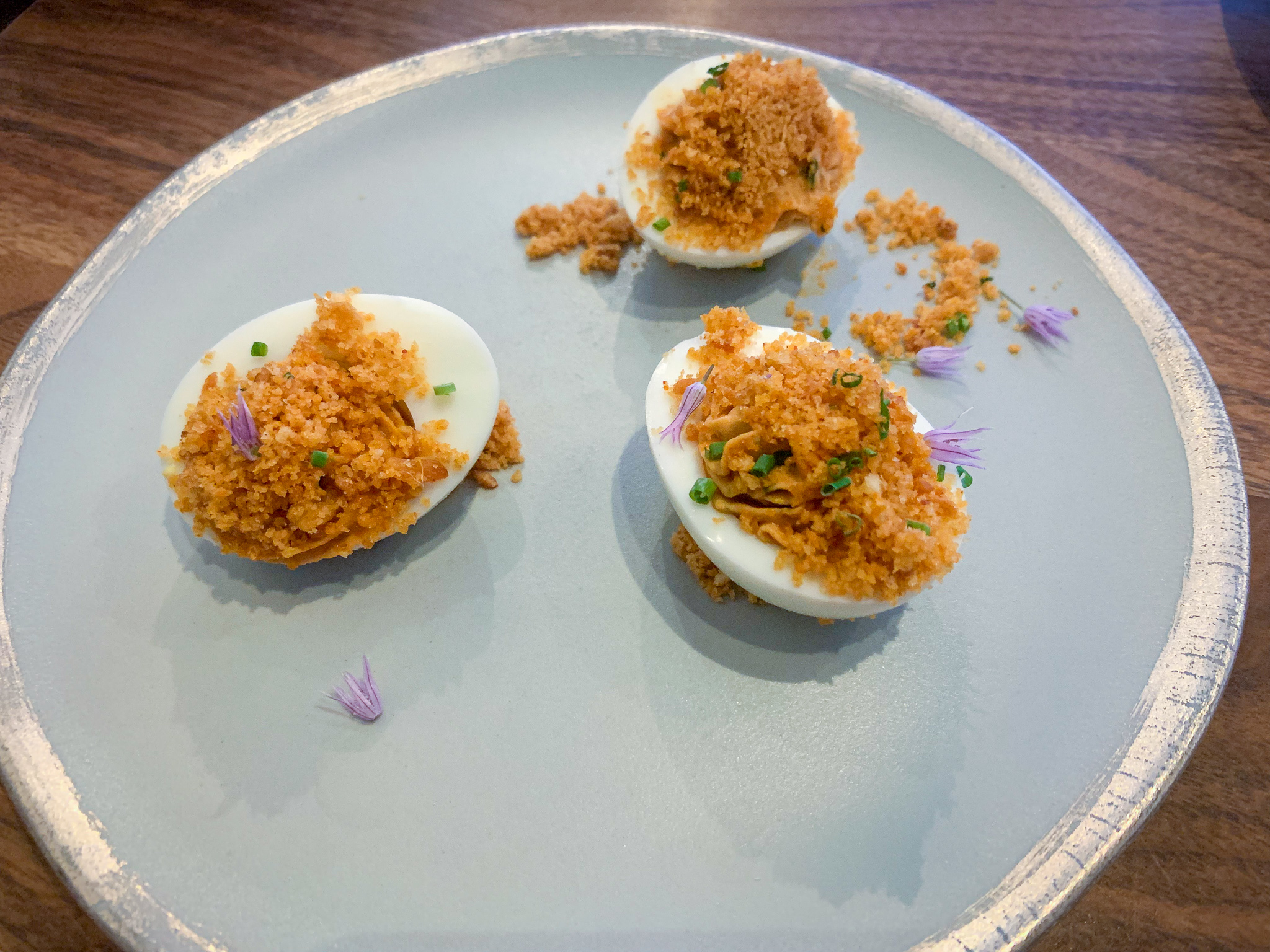 DEVILED EGGS chive . red charmoula . crackling