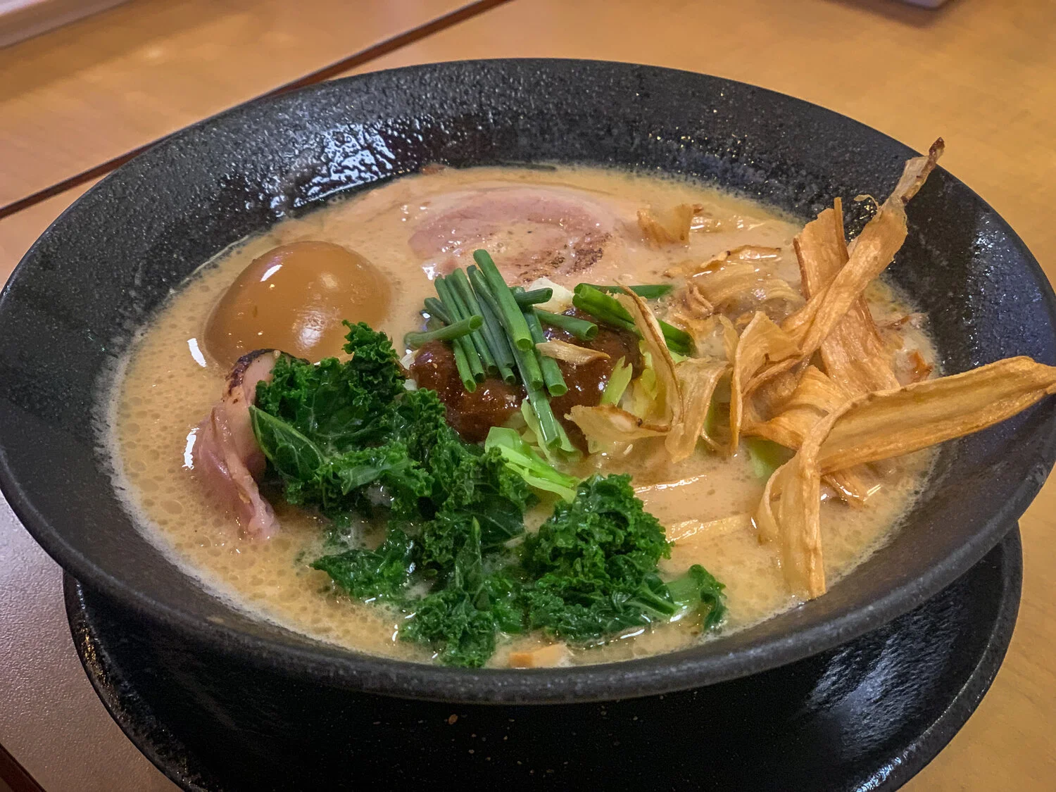 Shoyu ramen with chashu (pork): Clear Organic Chicken and Pork Soup, Fish Broth,Shoyu Dare, Pork Chashu, Duck Chashu, Kale, Kale Sprouts,Chives, Menma, Nori