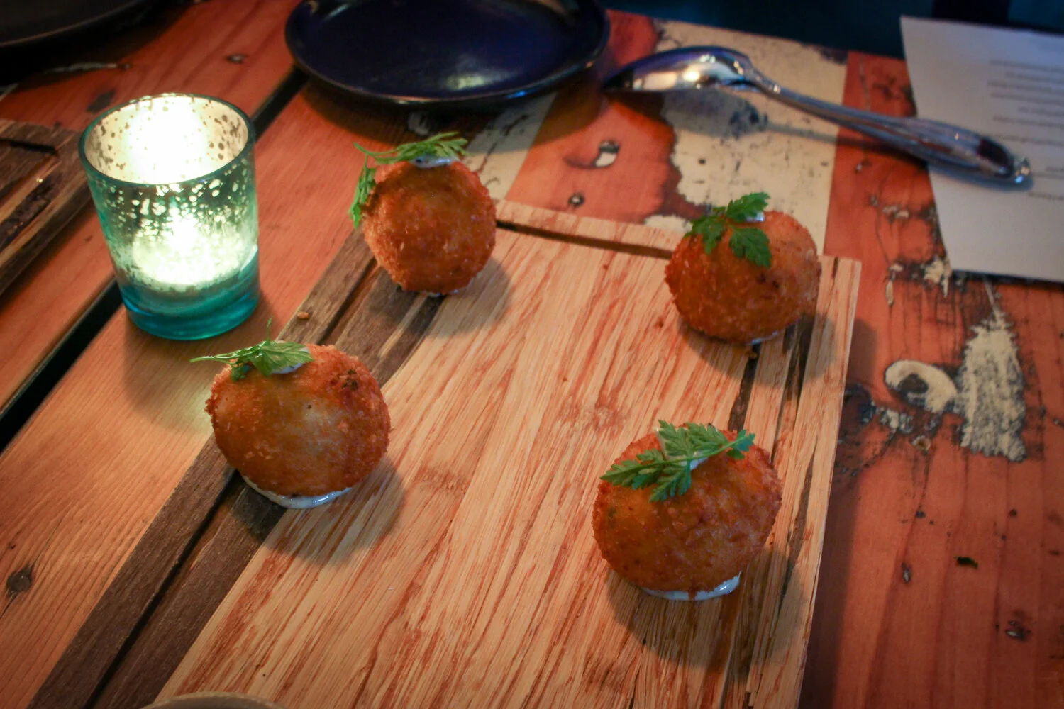 Croquetas: Braised chicken, Serrano ham, Calabrian chilies, Mahon, black truffle aioli.