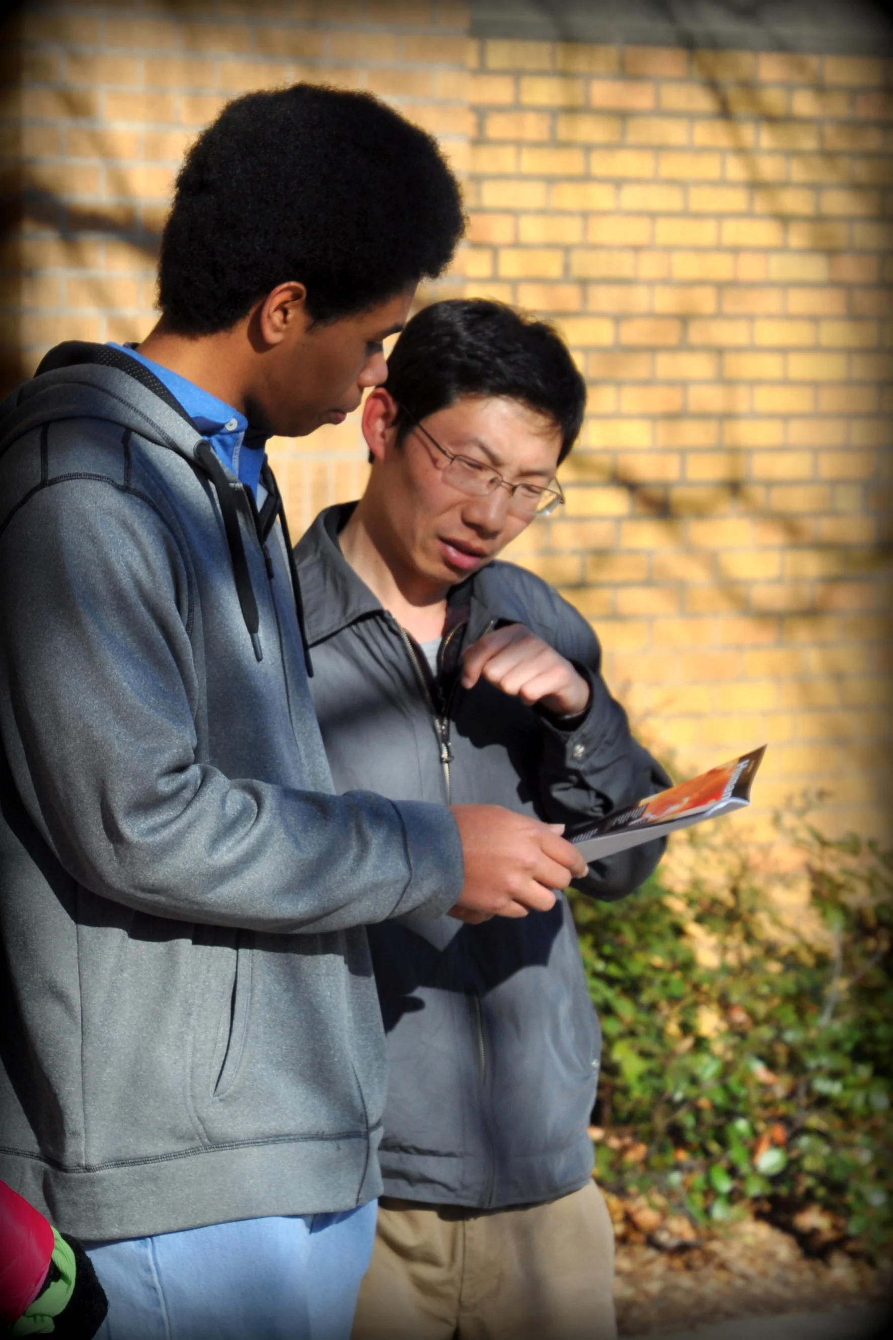 Keawe shares the JFA Brochure during outreach events at the University of North Texas in 2014 (above) and the University of Oklahoma in 2015 (below).