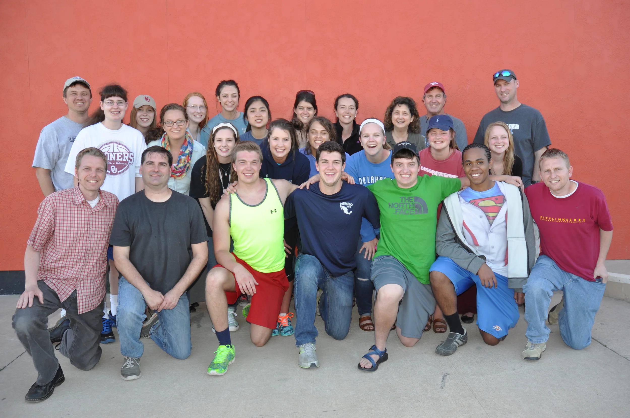 CHA students and JFA staff members pause after a day of outreach at the University of Oklahoma in March 2015. Keawe is in the first row, second from right.