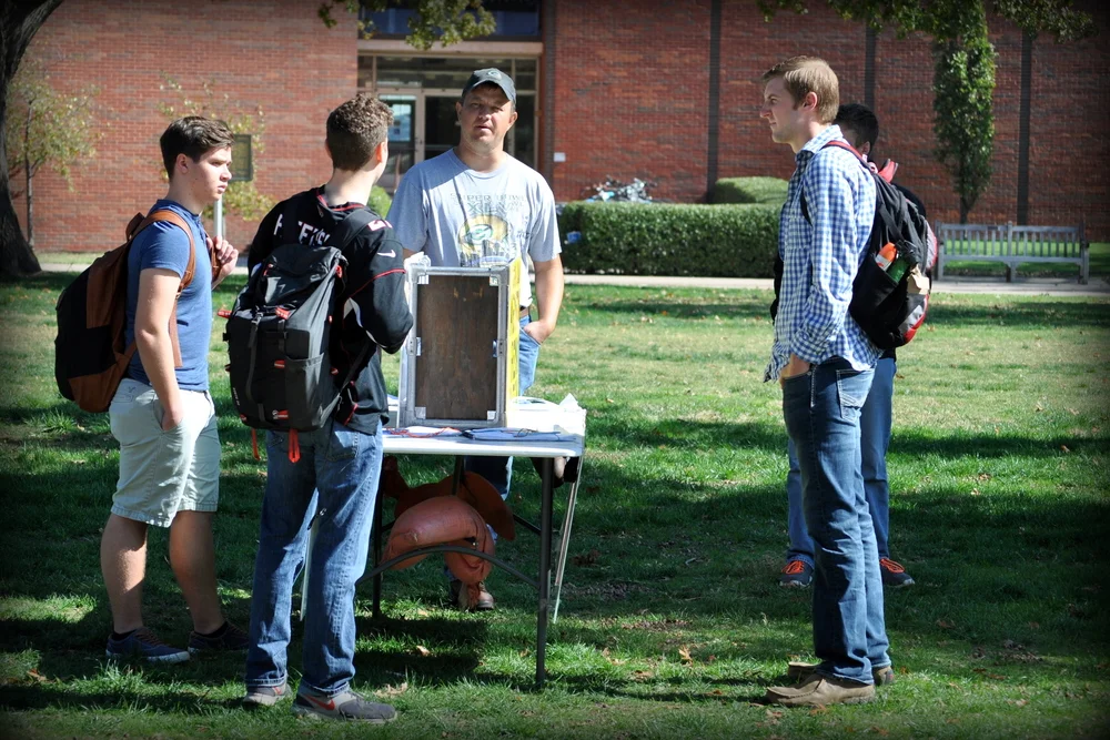 JFA veteran staff member Paul Kulas focuses his attention on a University of Oklahoma student in November.
