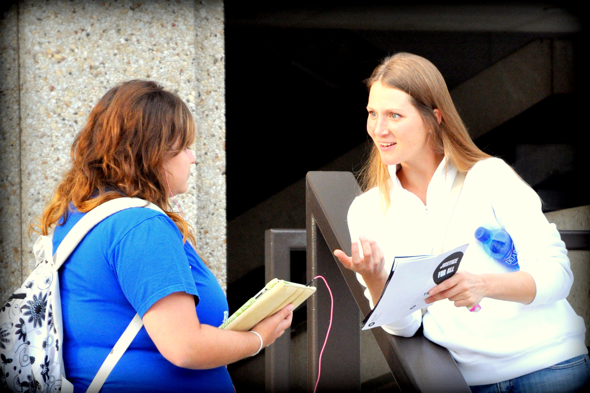Rachelle interacts with a student at the University of Kansas in 2012.