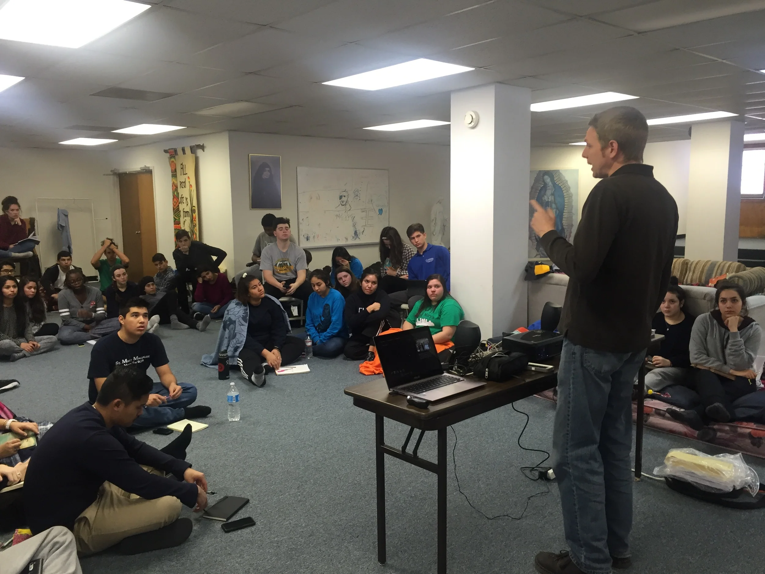 Students from Phoenix and I work on pro-life dialogue skills in a makeshift basement seminar environment. They were troopers!