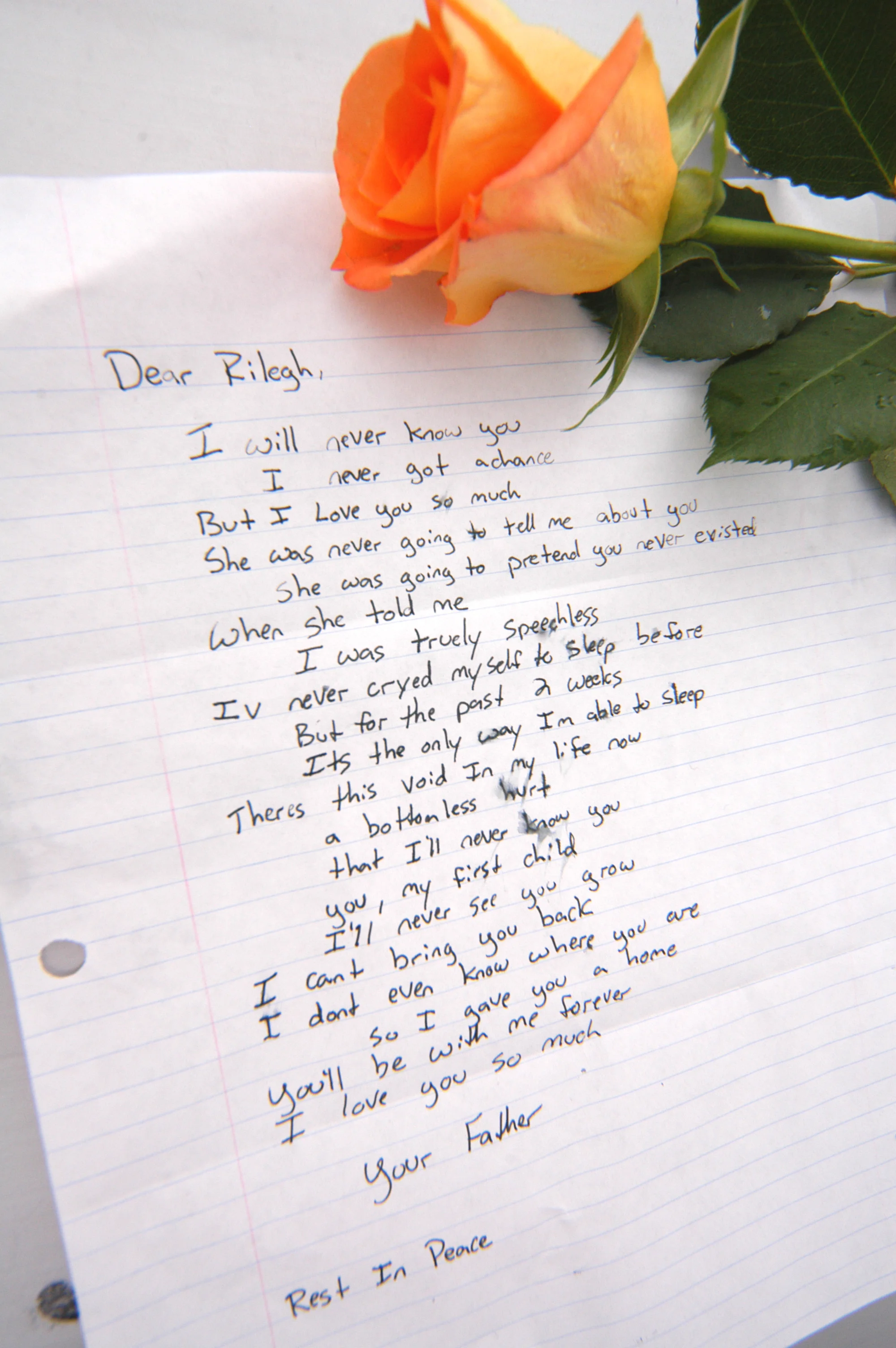 "Dear Rilegh" - A forlorn young father left this letter and rose on the JFA Poll Table at Colorado State University in 2004.