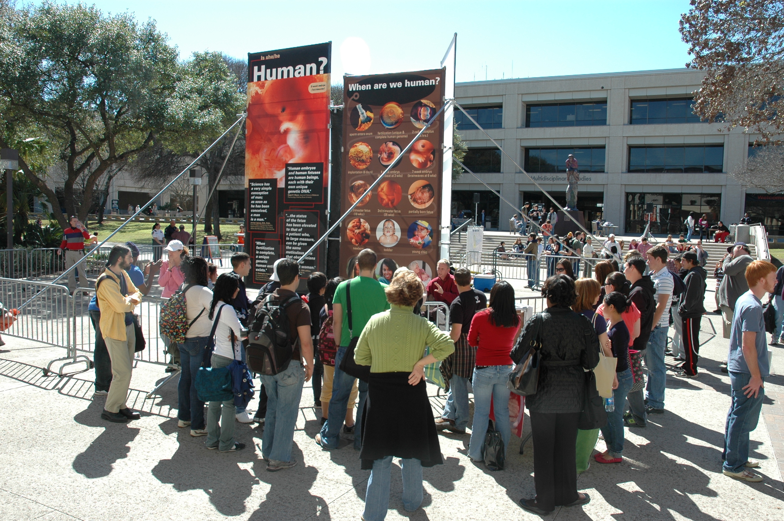At the University of Texas at San Antonio in 2009, JFA trainer Jon Wagner (maroon shirt, center) interacts with a crowd of students.