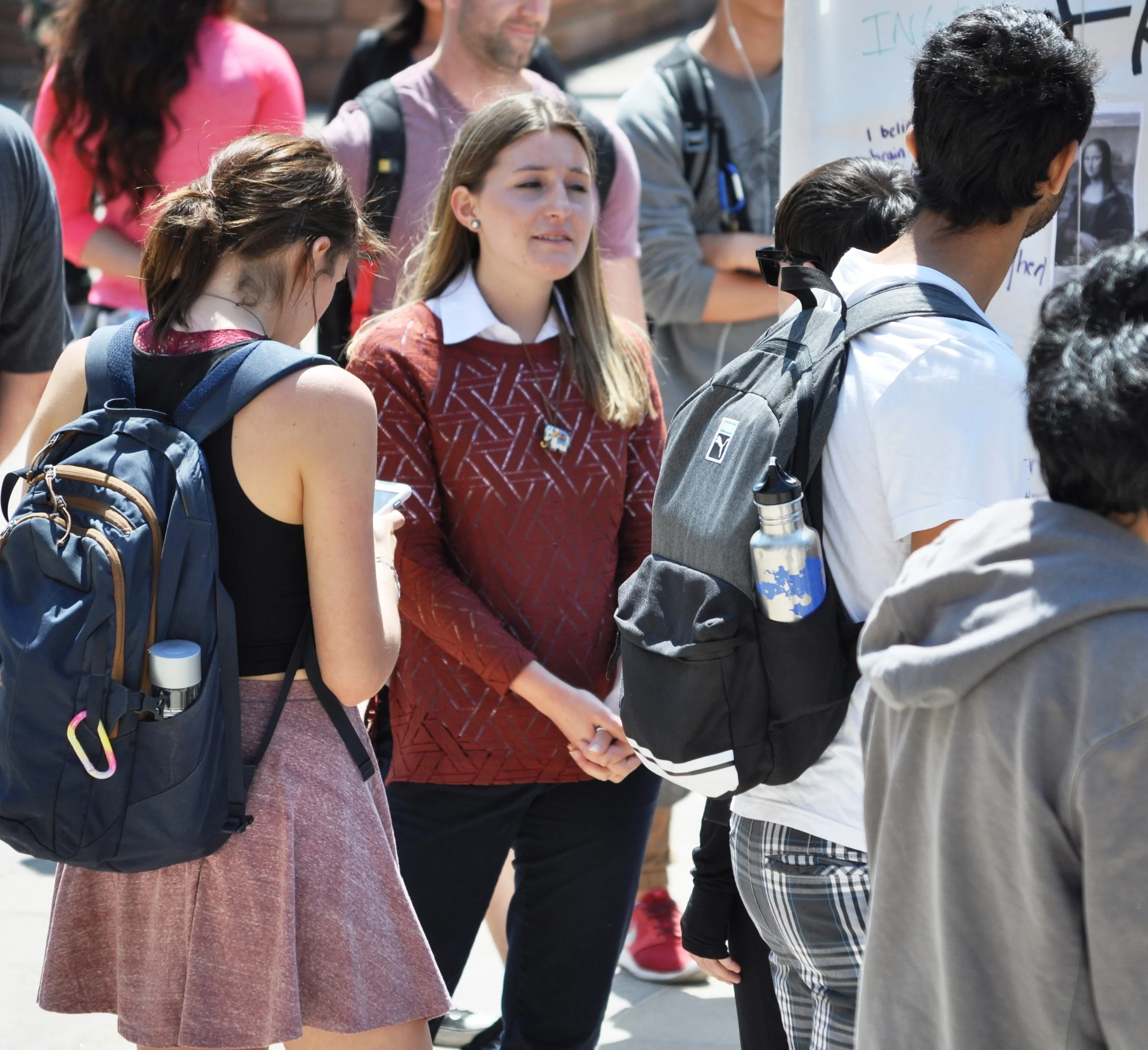  Meredith, an Art History major, was ecstatic that JFA brought the   Art of Life  Exhibit  to UCLA.&nbsp; Here, she interacts with other UCLA students in front of that exhibit. 