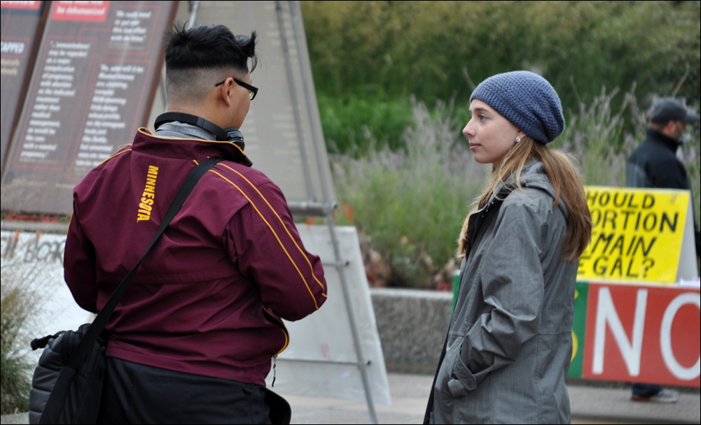 JFA Intern Susanna Buckley (right), who authored this report, at JFA’s University of Minnesota (UMN) outreach in October
