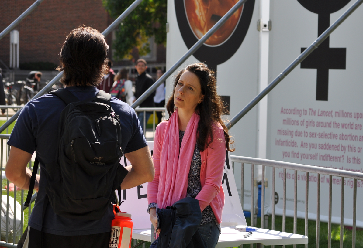 Stephanie Gray, author of Love Unleashes Life , joined the JFA team for the Purdue outreach. Here she listens to a Purdue student. Click here to learn more about Stephanie or to purchase her book.