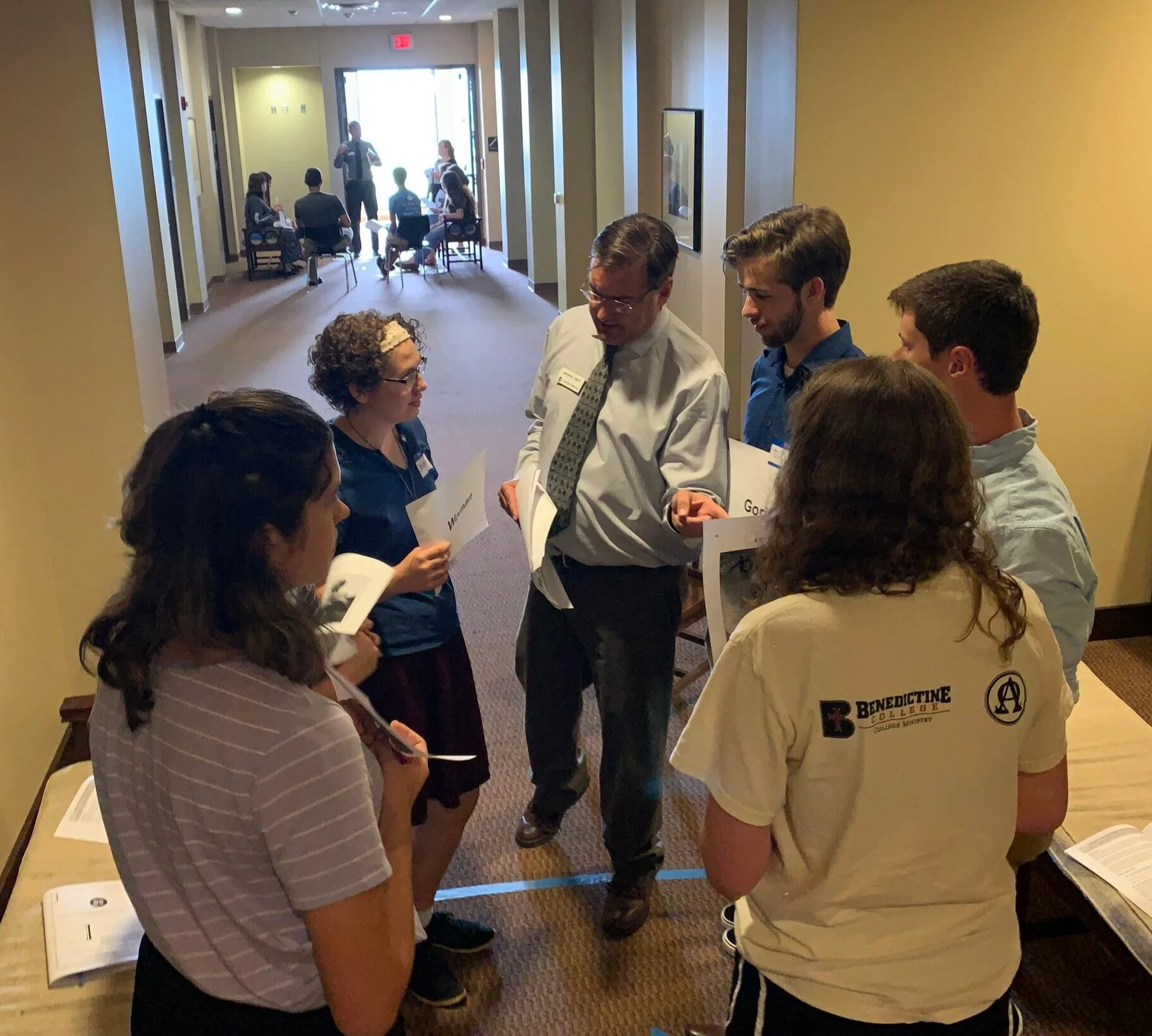 Sunday (Benedictine College): Jeremy Gorr steps into the “blue box” as he helps students think through “who would be in and who would be out” if various explanations of equal rights were true.