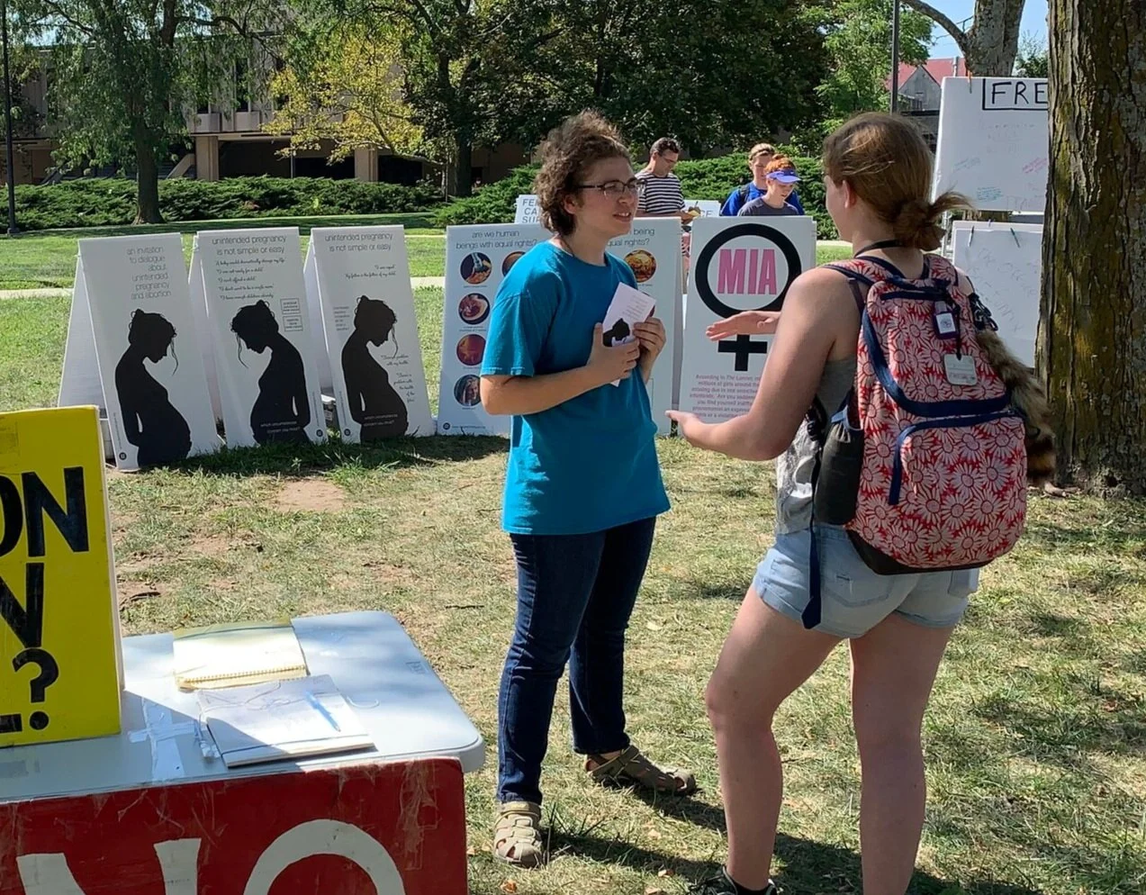Wednesday (KU): Catherine (left) was one of nine Benedictine College students who participated in the outreach at KU.