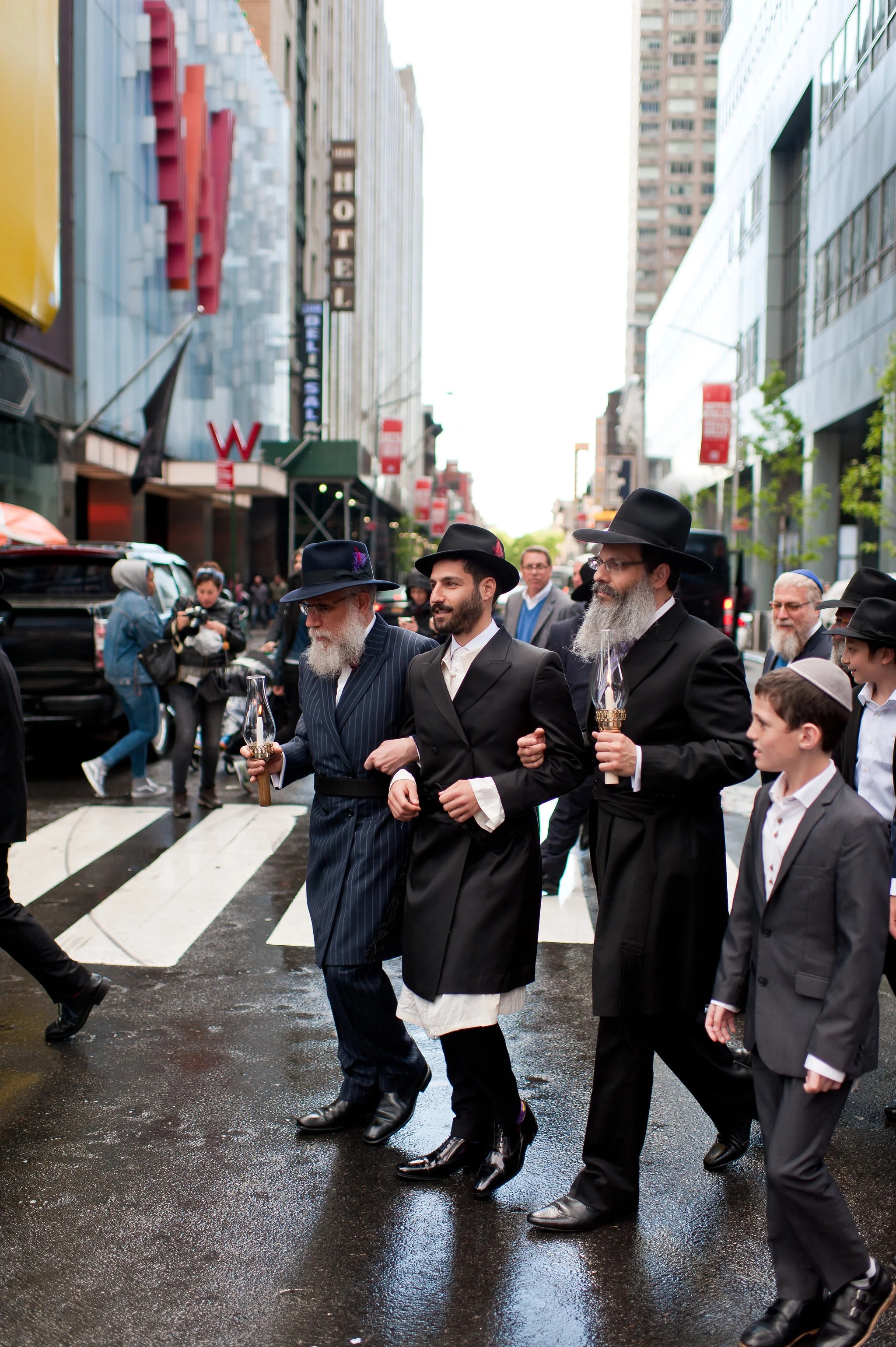 Historic Chabad Orthodox Jewish Wedding in Times Square Manhattan New York NYC Photo by Chaim Schvarcz, groom, father of the groom, father of the bride, walking down the isle