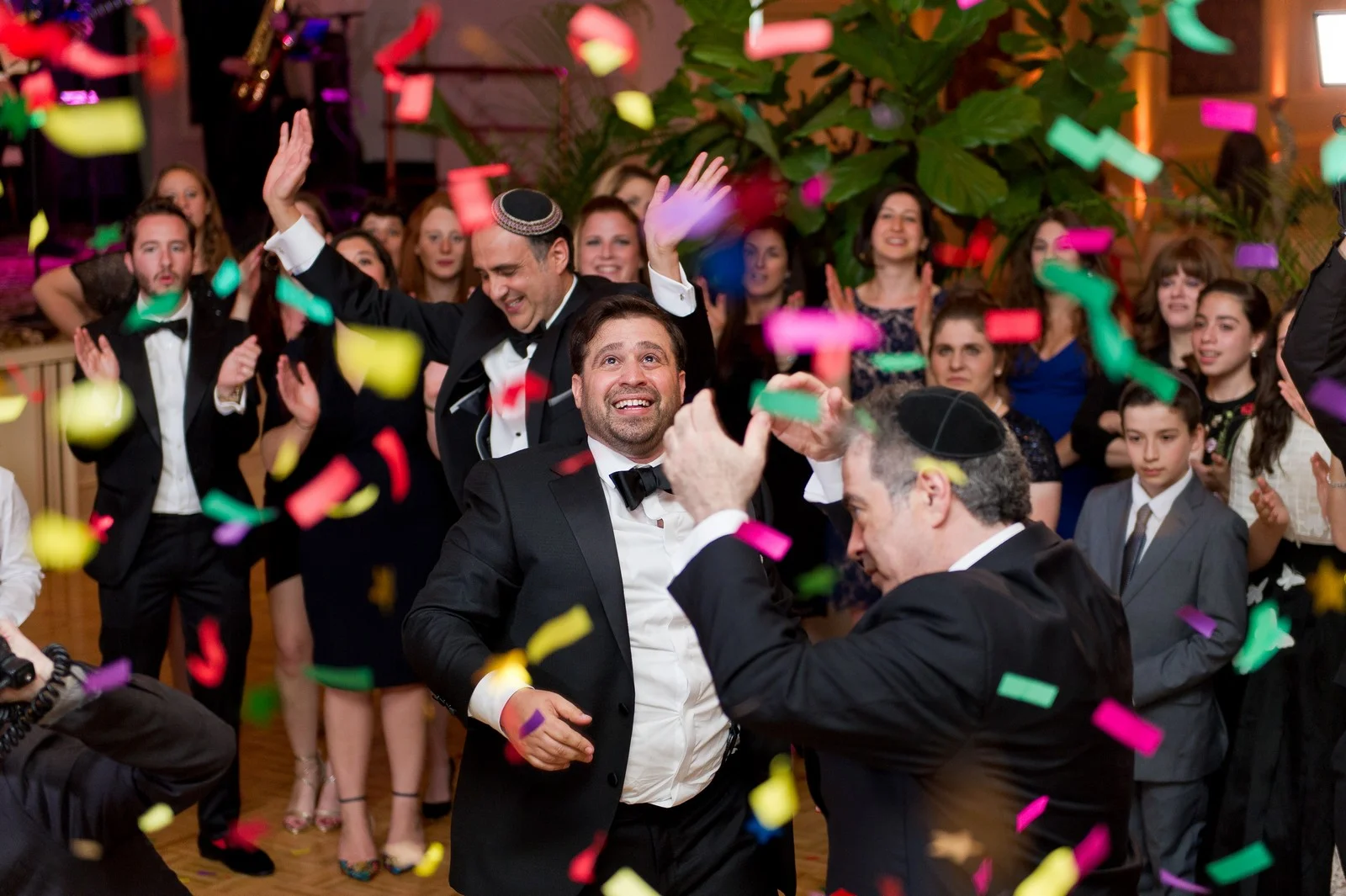 Yoey and Aaron's Memorial Day Modern Jewish Wedding at Anthony's Pier 9, New Windsor, NY Photos by Chaim Schvarcz dancing confetti