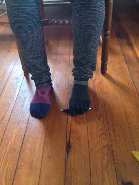 Pick up a pen with your toes