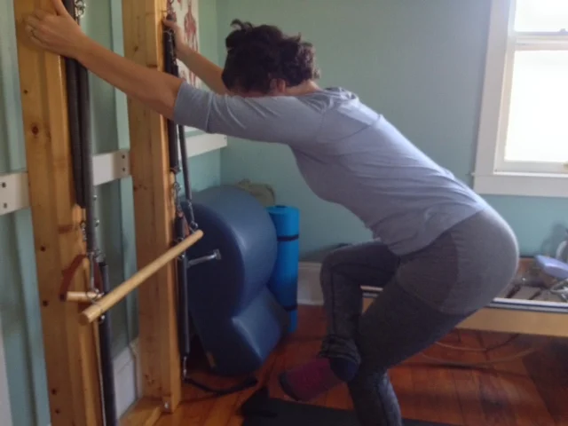 Standing hip/butt stretch