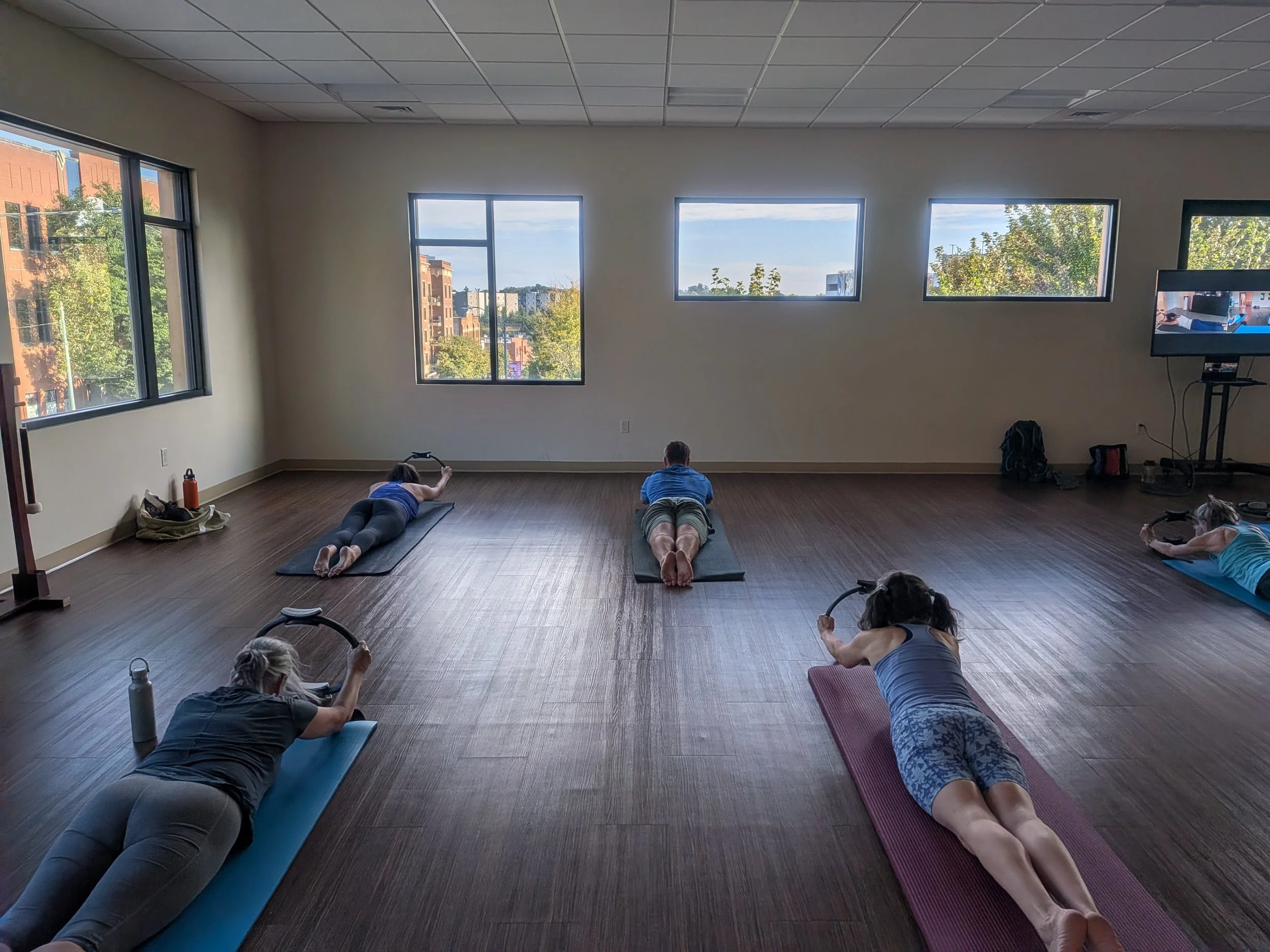 Asheville Pilates mat classes taught by Alexis Miller at Asia House
