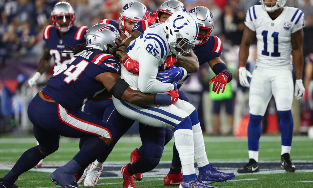 Eric Ebron tackled.jpg