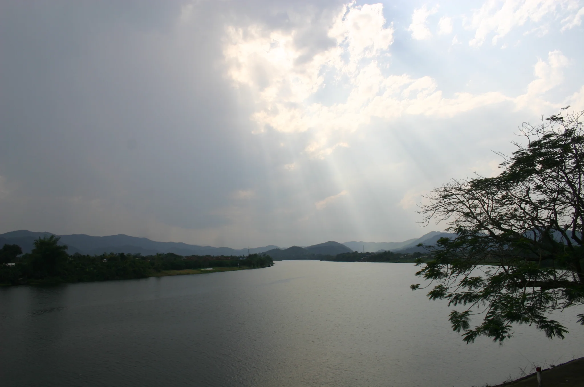 The Thien Mu Pagoda sits on a hill overlooking the river.