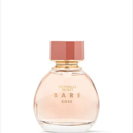 A glass perfume bottle with a pink cap labeled Victoria's Secret Bare Rose.