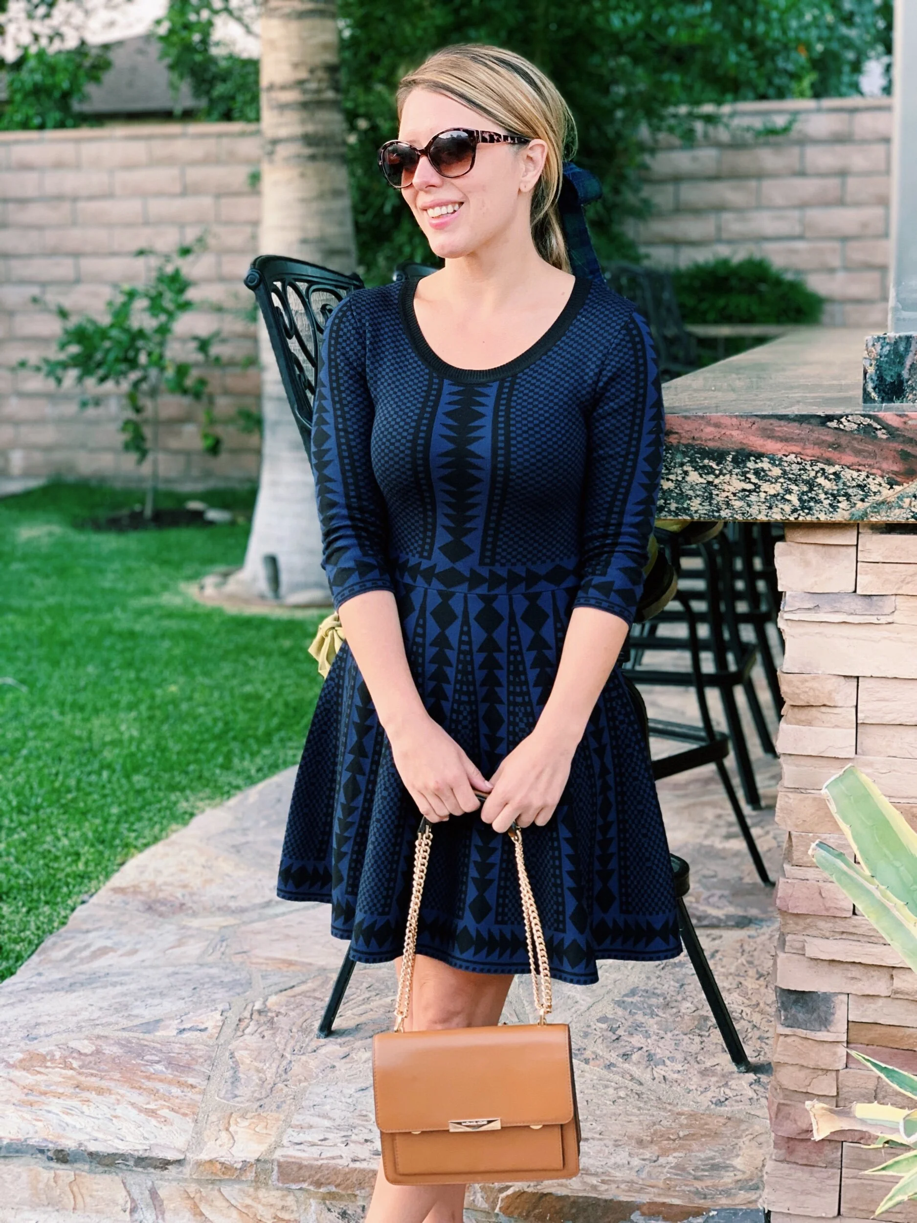 Three Heel Clicks - TREND TO WATCH: SNEAKERS AND A SWEATER DRESS