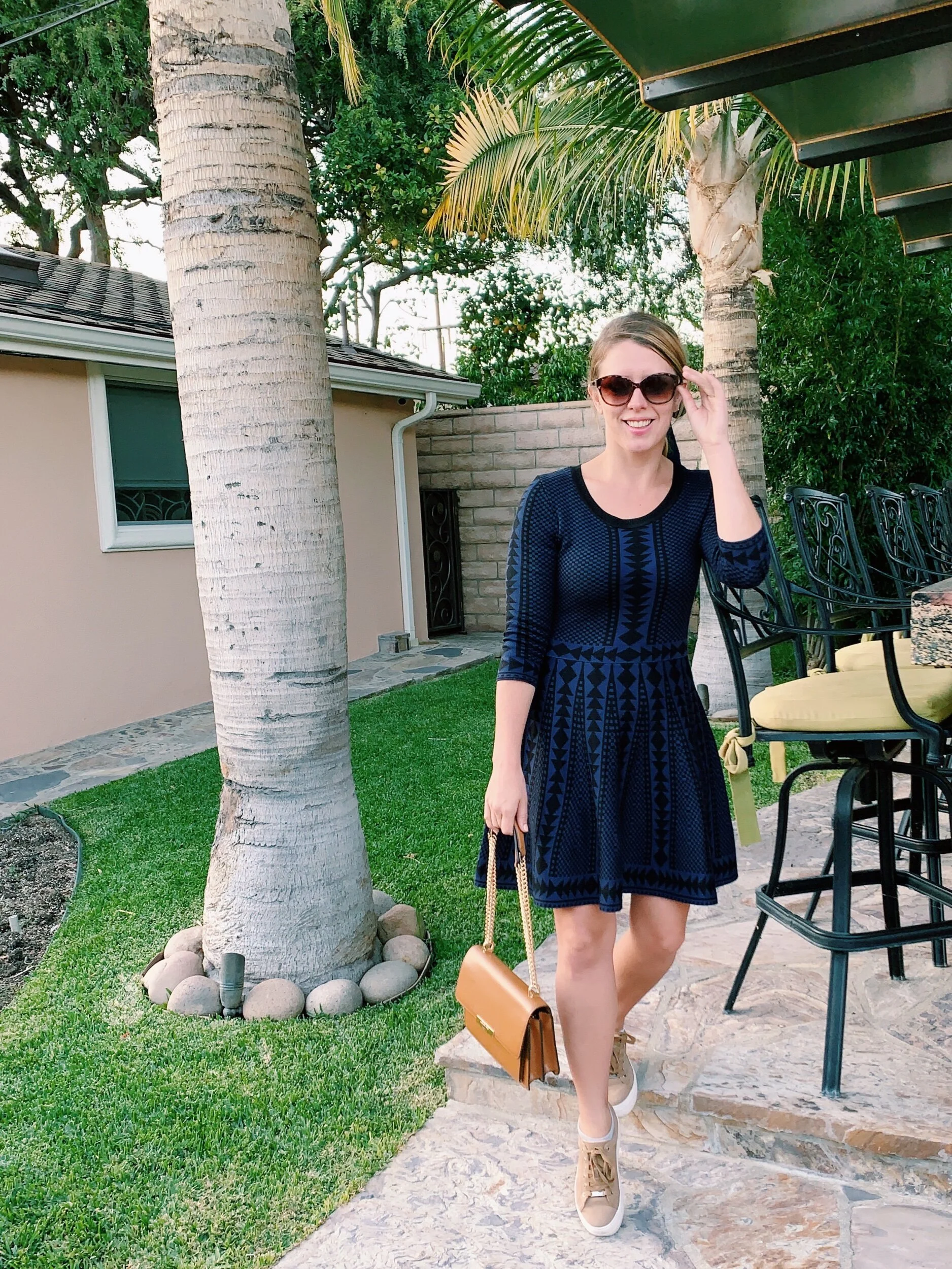 Three Heel Clicks - TREND TO WATCH: SNEAKERS AND A SWEATER DRESS