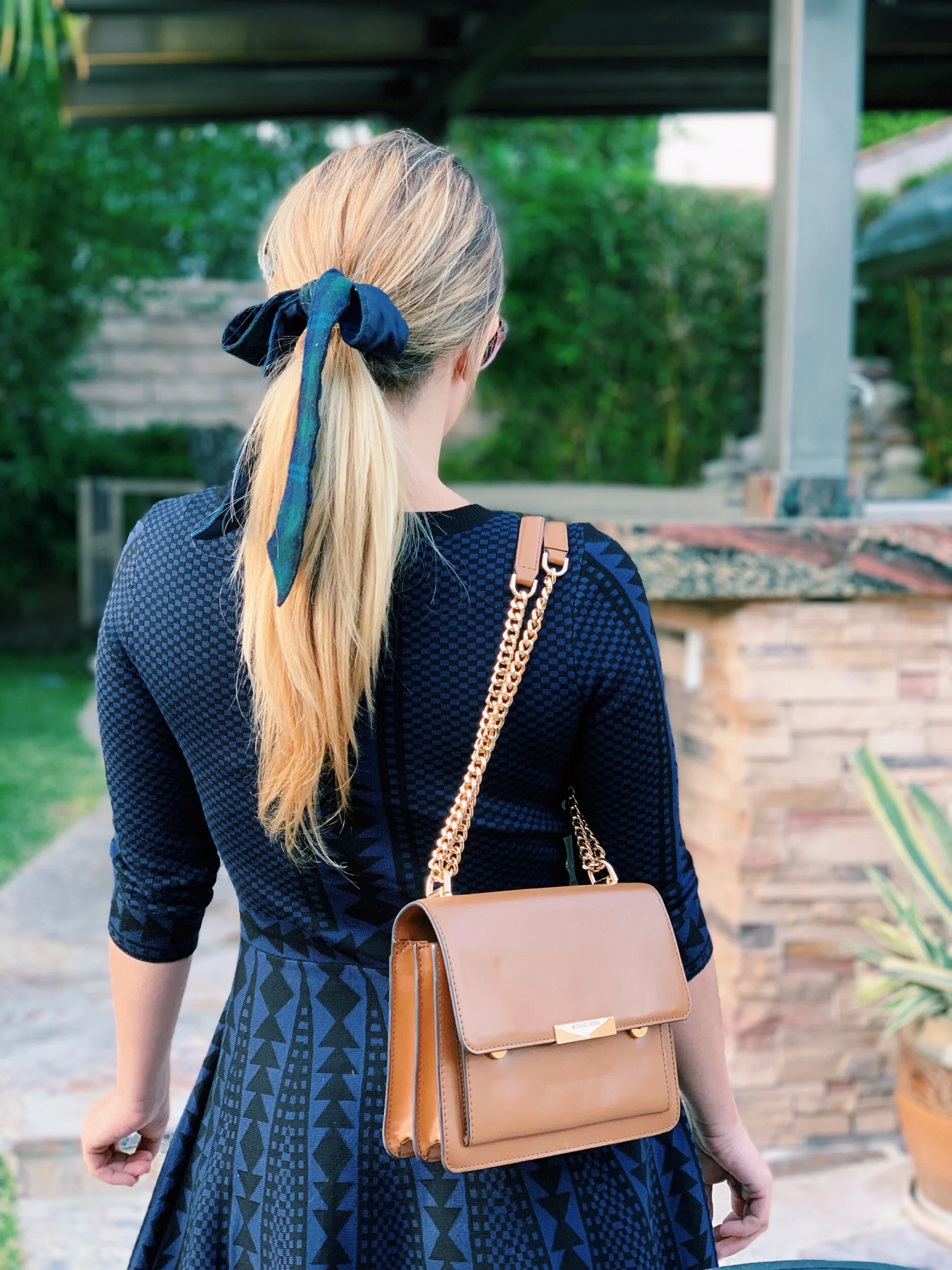 Three Heel Clicks - TREND TO WATCH: SNEAKERS AND A SWEATER DRESS