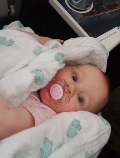  Georgia with her pacifier on the plane