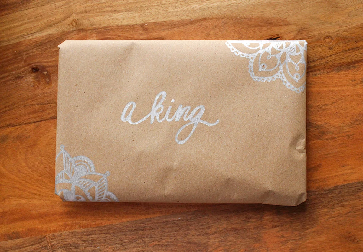 Simply Gifted: Easy gift wrapping idea using brown paper and metallic sharpies.