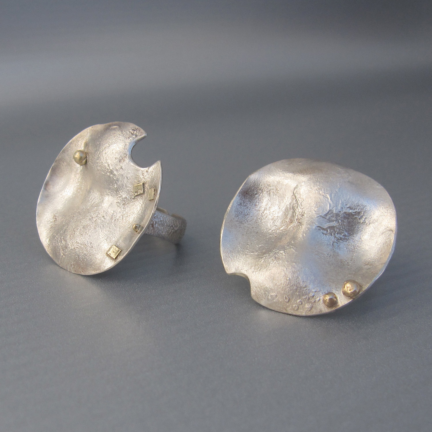 This statement "lunare" rings are handmade in reclaimed silver and gold