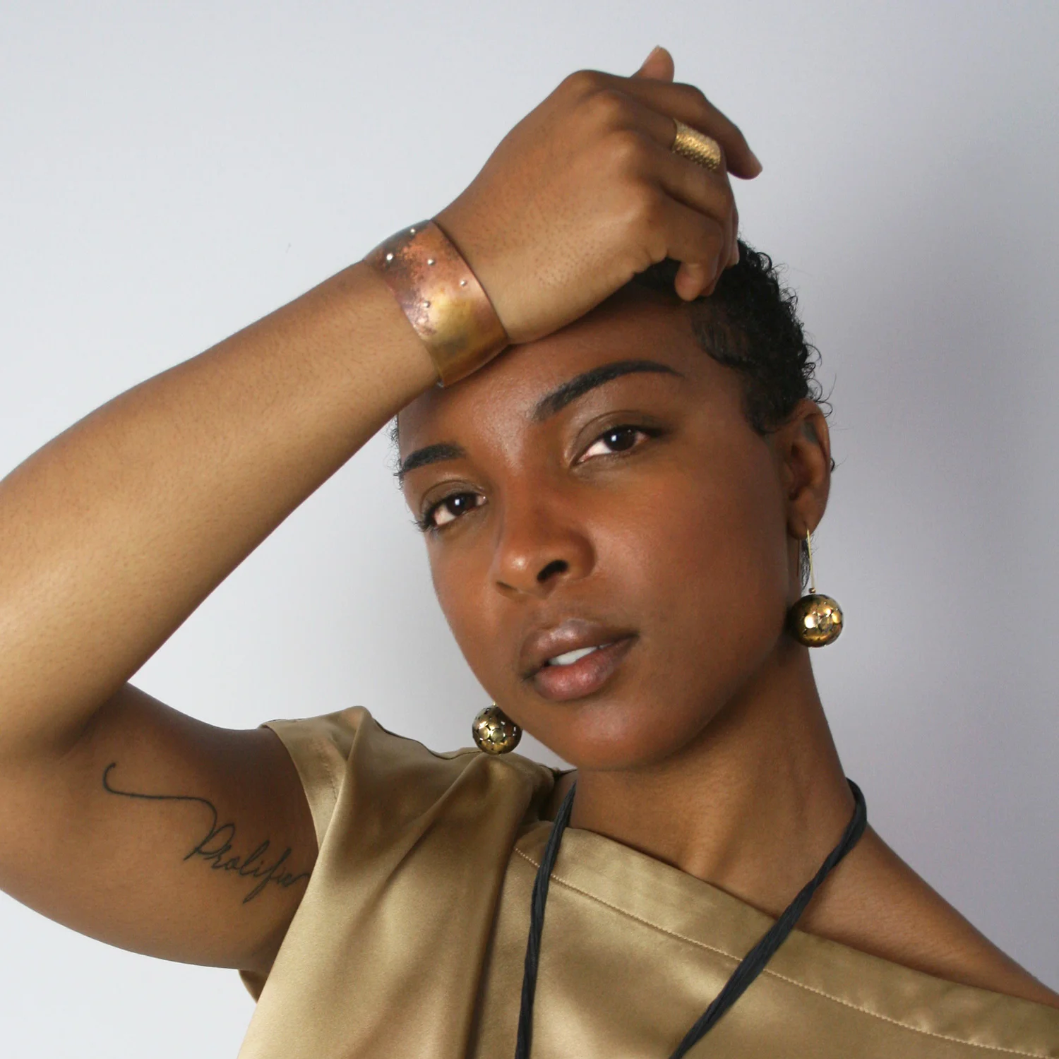 terra cuff + occhio composto earrings