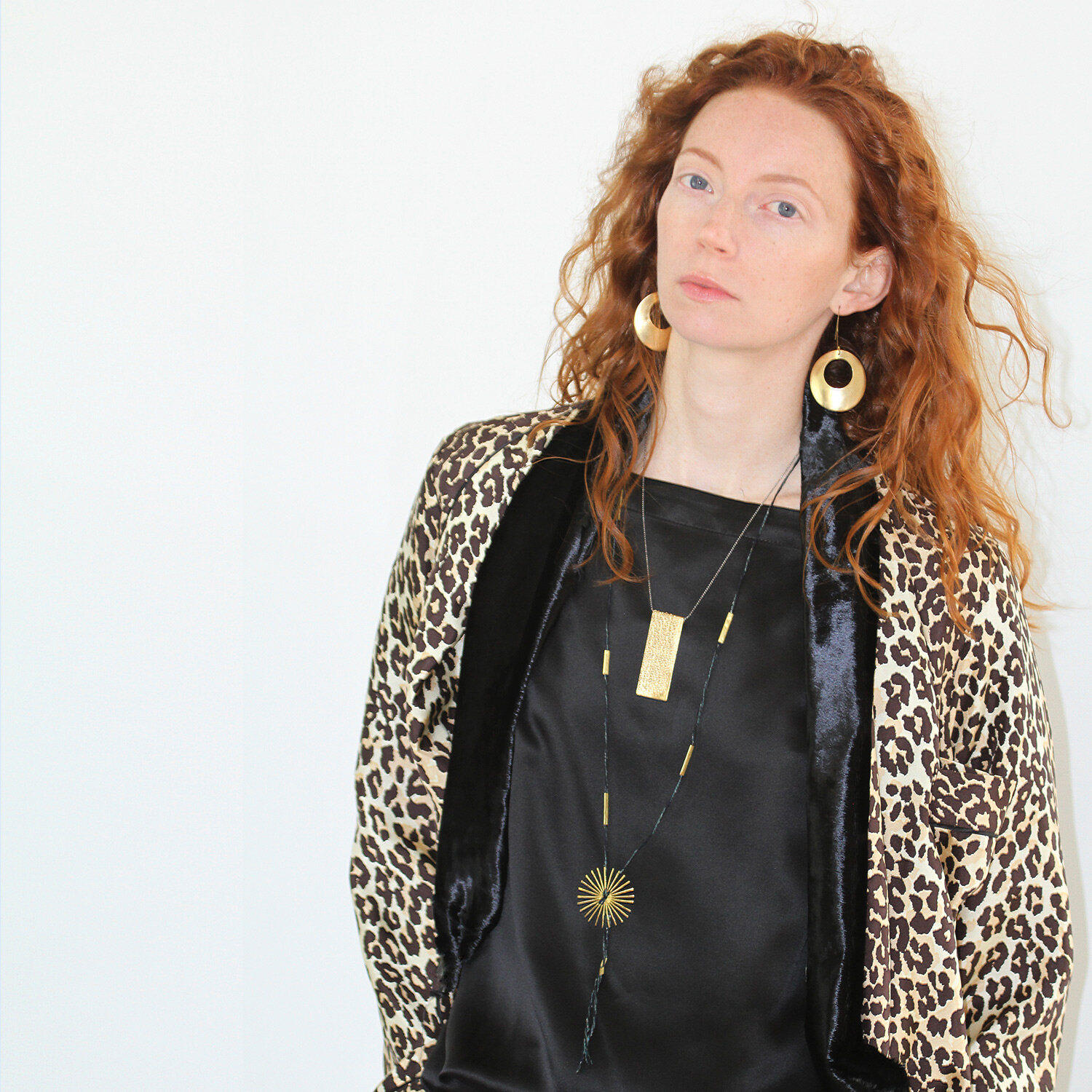 sole necklace + sassolini necklace + occhioni piegati earrings