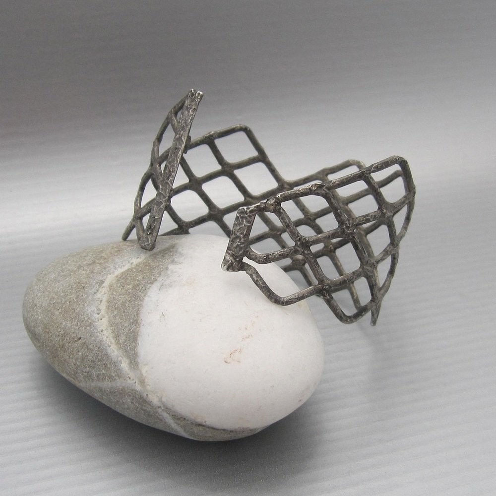 One of a kind and handmade in reclaimed silver and solid gold.

Available here: https://www.maddalenabearzi.com/one-of-a-kind/relitto-nero-e-oro-bracelet

Image+design: maddalenabearzi