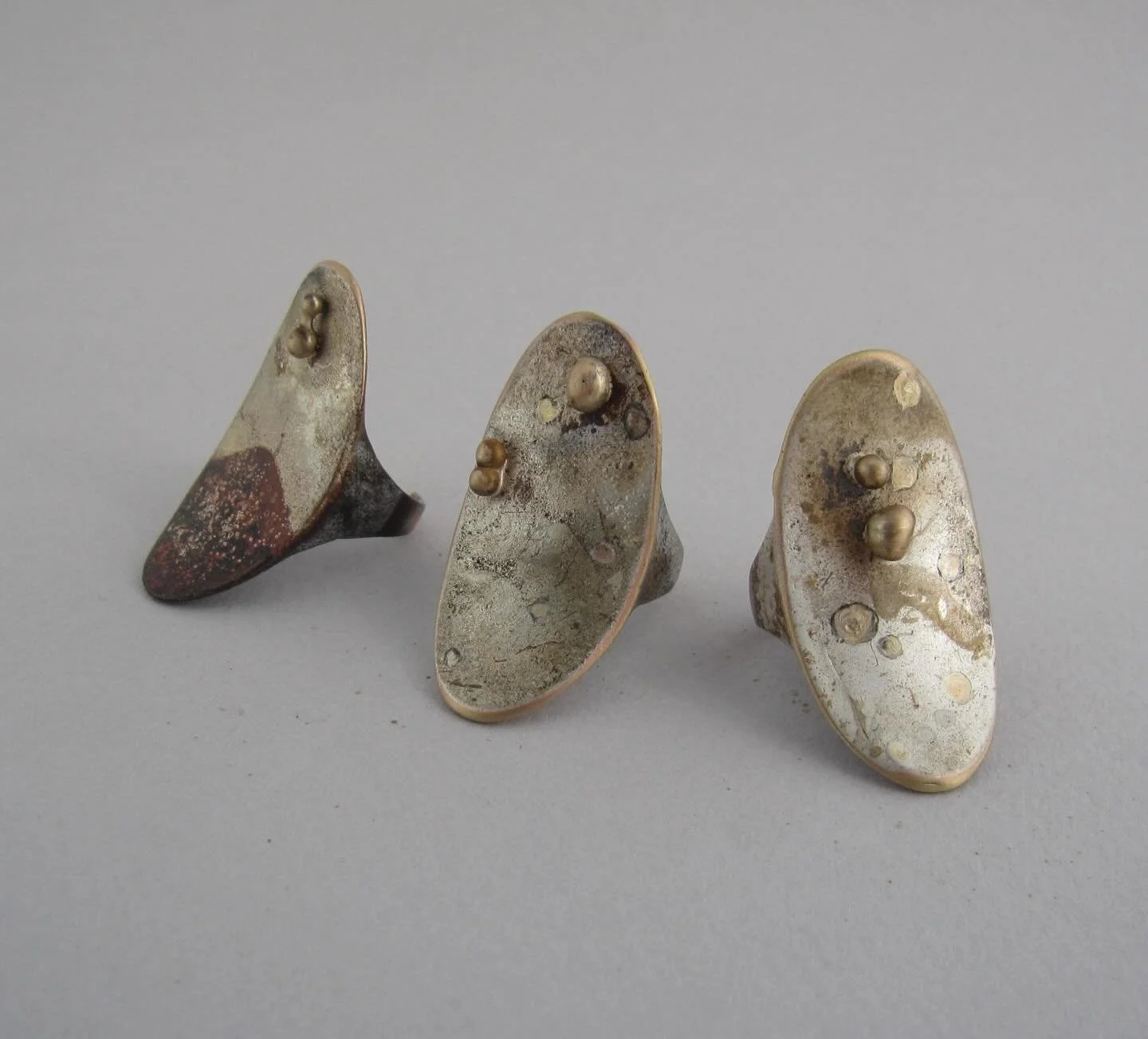 Meet the Pianeta Nano rings. 
The design of these rings draws inspiration from Haumea, a dwarf and oval shaped  planet located beyond Neptune&rsquo;s orbit. 
Unique, adjustable and handmade in silver, bronze and copper.

Online @ https://www.maddalen