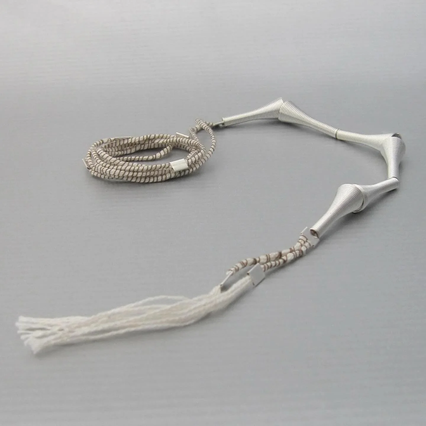 🌪 Spotlight on the Uragano Argenteo necklace. Handmade in Japanese silk wrapped in silk and finished in sterling silver. ✨ Enjoy 40% OFF this week with code SALE‑VIII‑40.

Image and design: maddalenabearzi