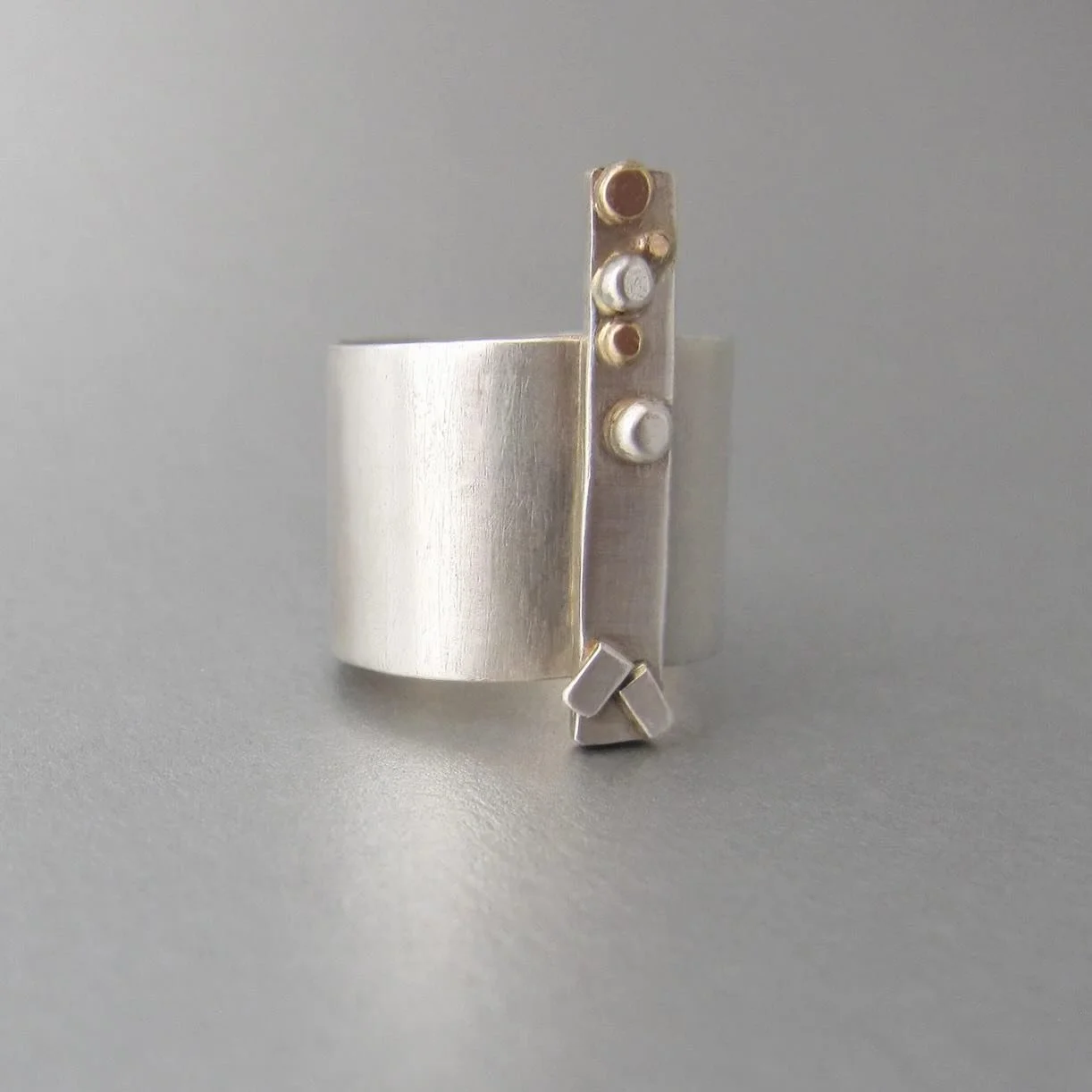 Albero ring - simple, elegant, timeless.

Handcrafted in pure silver and 18k gold

Image +design: maddalenabearzi