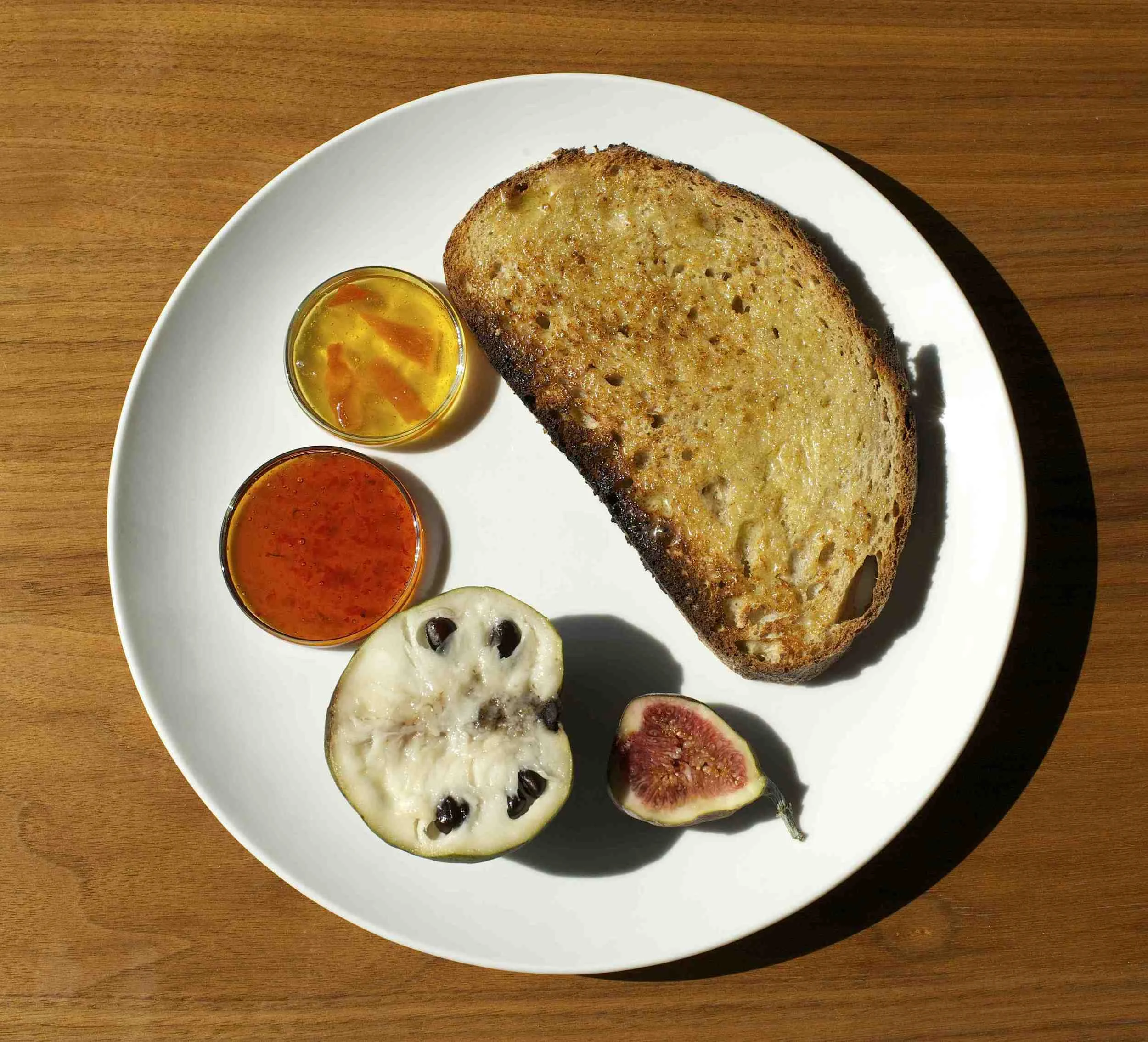 Toast w/six-pepper jelly, seville orange marmalade, cherimoya & fig