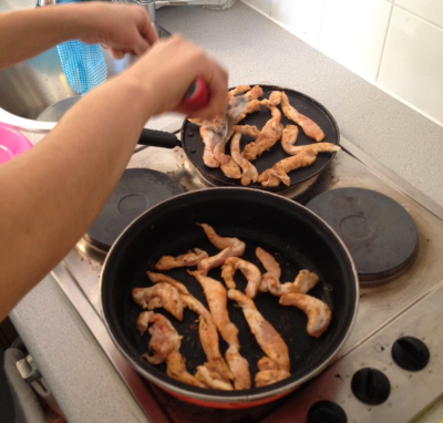 Pan searing our blackened chicken strips
